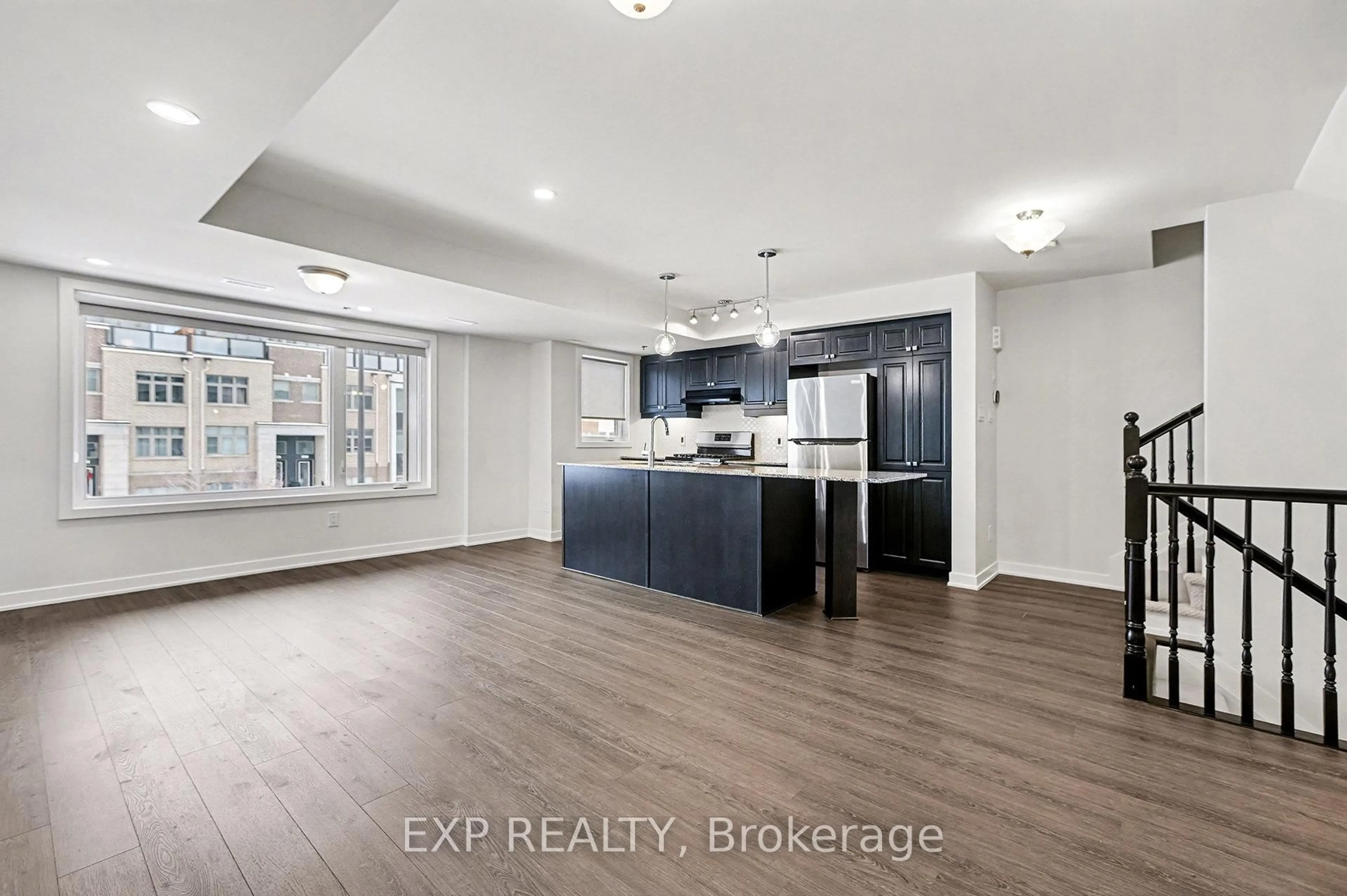 Open concept kitchen, ceramic/tile floor for 770 Mikinak Rd, Ottawa Ontario K1K 5A5