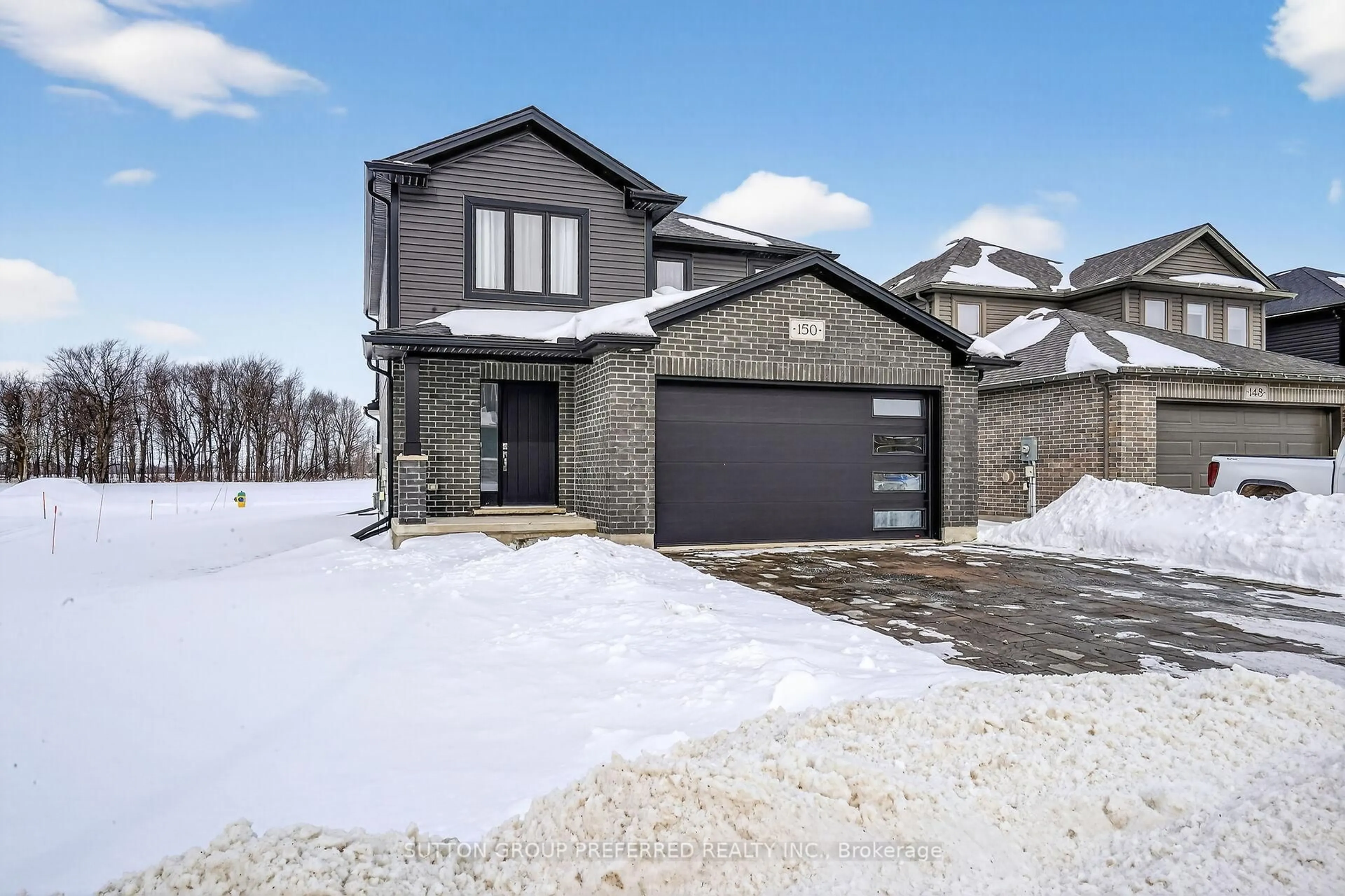 Home with brick exterior material, street for 150 Gilmour Dr, Lucan Biddulph Ontario N0M 2J0