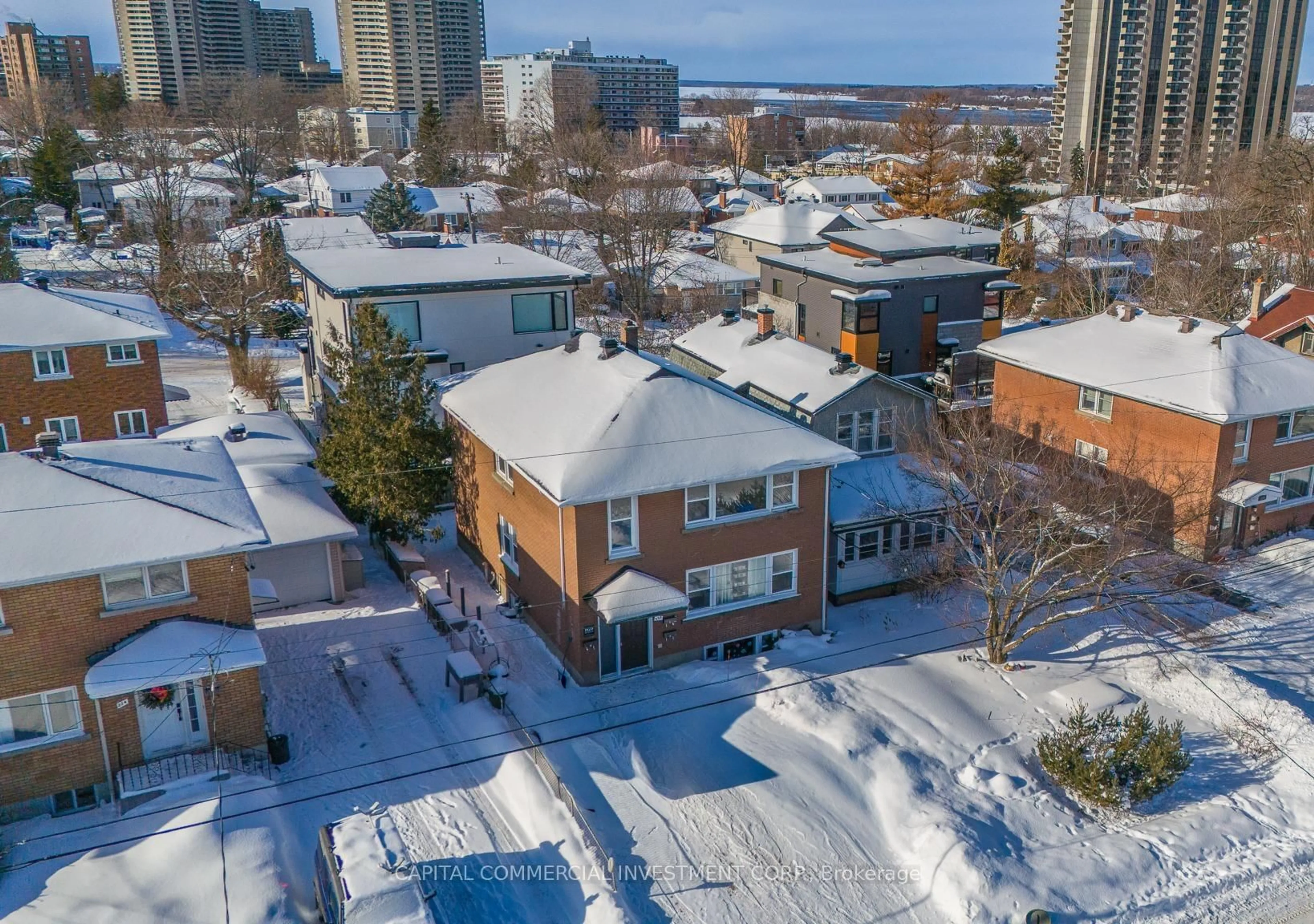 A pic from outside/outdoor area/front of a property/back of a property/a pic from drone, city buildings view from balcony for 220 Compton Ave, Ottawa Ontario K2B 5A9