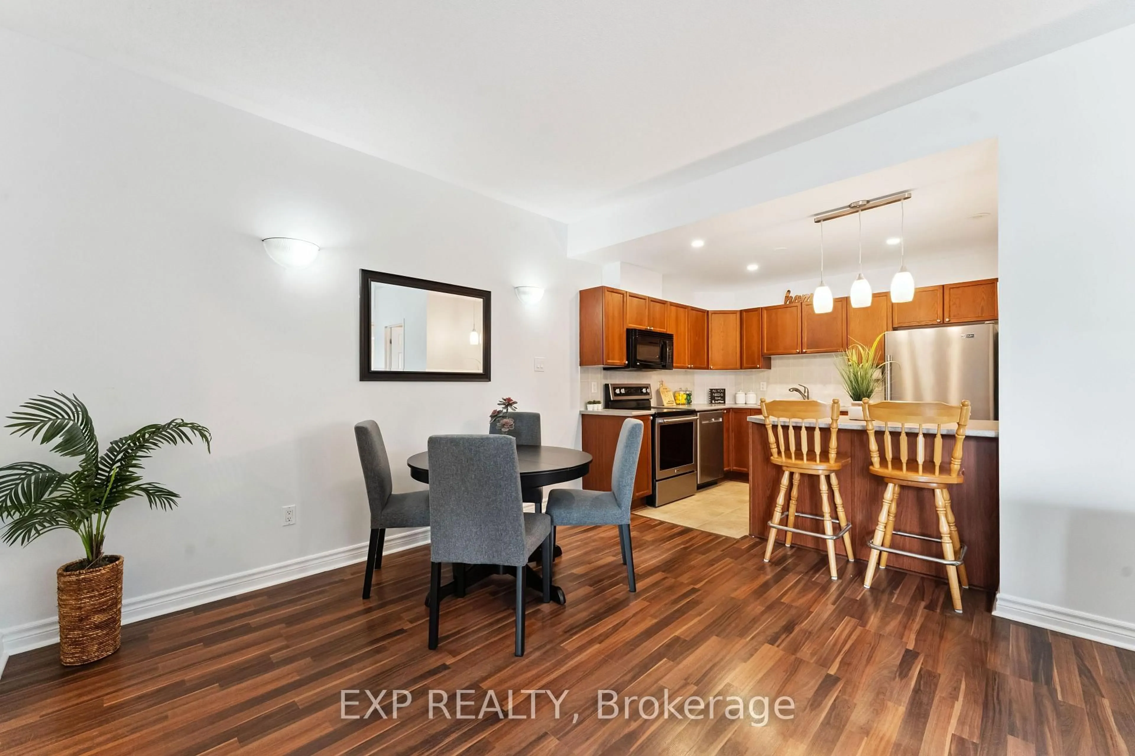 Open concept kitchen, wood/laminate floor for 231 Crestway Dr #B, Ottawa Ontario K2G 7C5