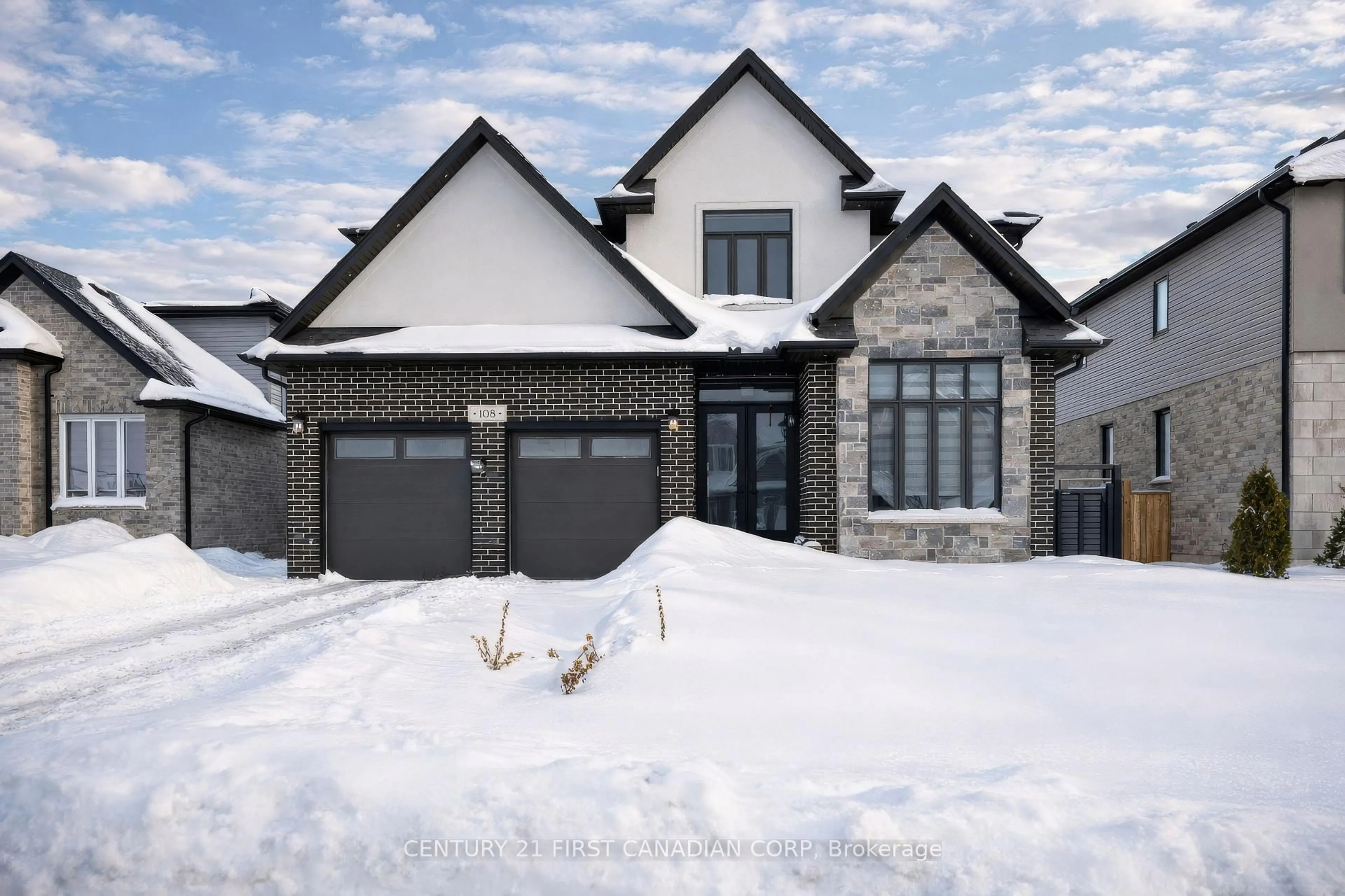 Home with brick exterior material, street for 108 Watts Dr, Lucan Biddulph Ontario N0M 2J0