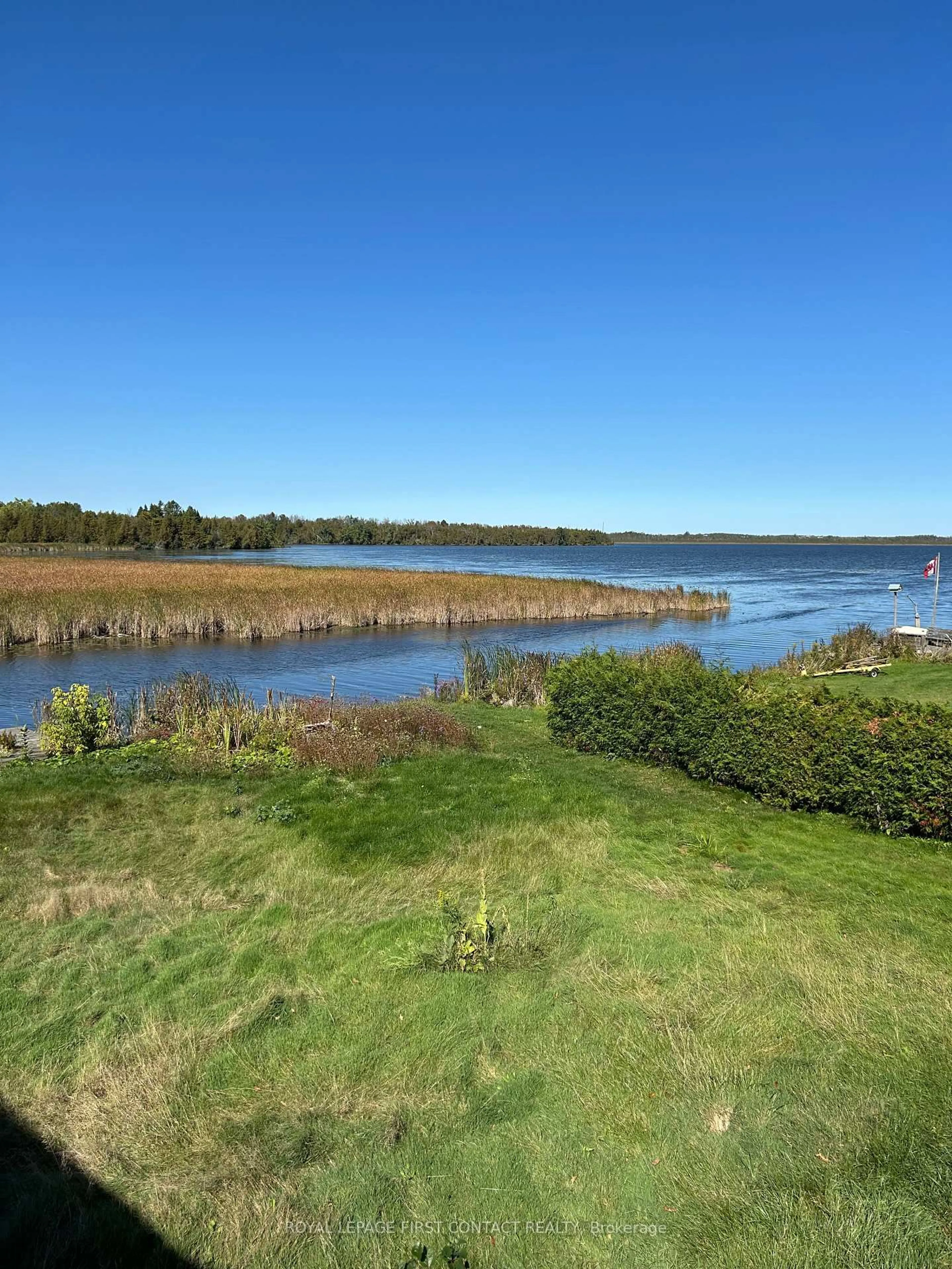 A pic from outside/outdoor area/front of a property/back of a property/a pic from drone, water/lake/river/ocean view for 16 Leisure Lane, Kawartha Lakes Ontario K9V 4R1