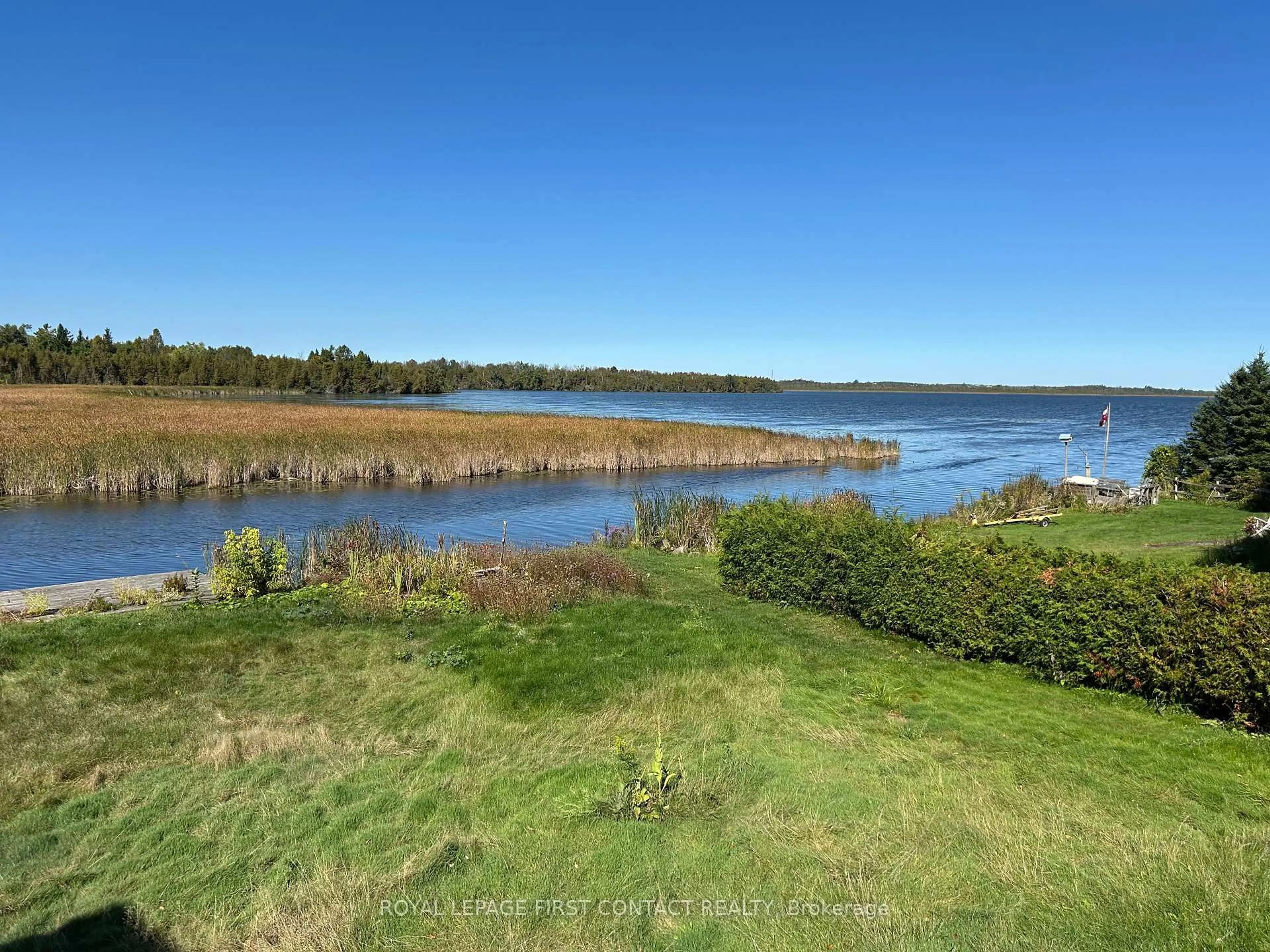 A pic from outside/outdoor area/front of a property/back of a property/a pic from drone, water/lake/river/ocean view for 16 Leisure Lane, Kawartha Lakes Ontario K9V 4R1