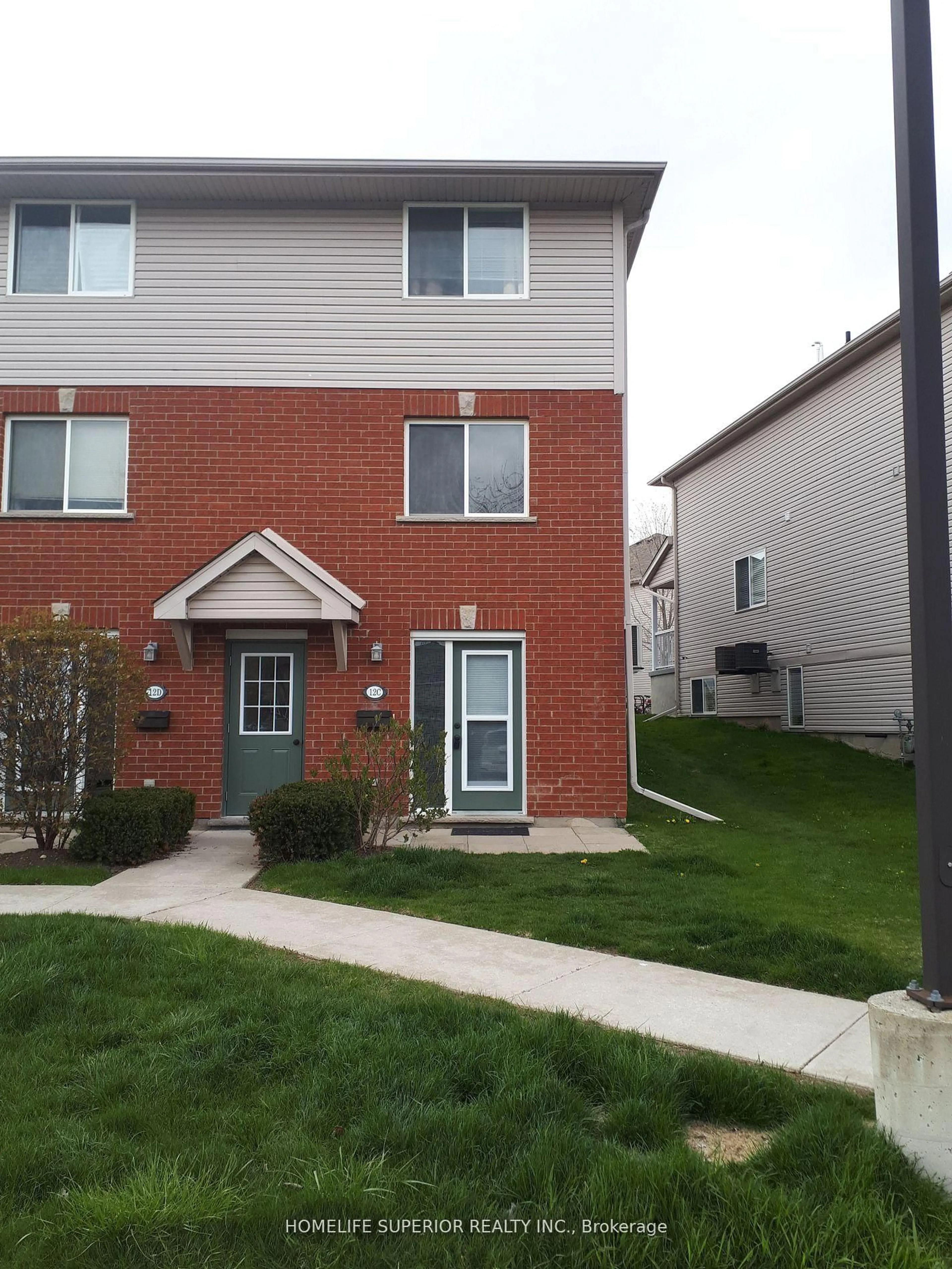 Home with brick exterior material, street for 139 Brighton St #12C, Waterloo Ontario N2J 4Z5