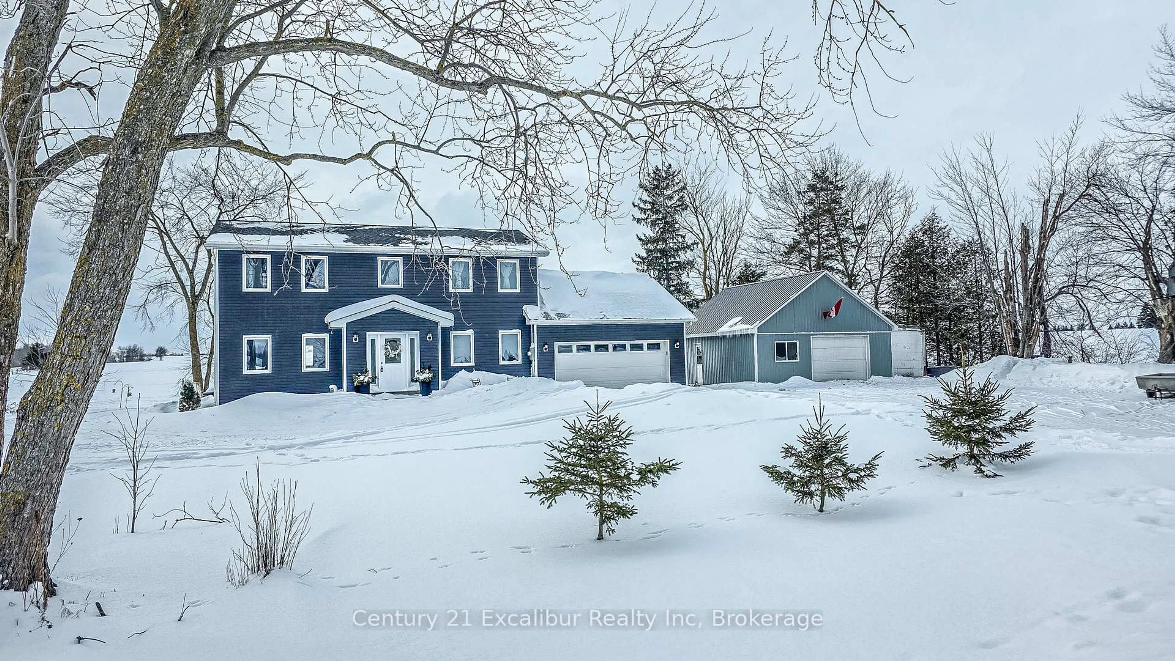 A pic from outside/outdoor area/front of a property/back of a property/a pic from drone, street for 7104 6th Line, Centre Wellington Ontario N0B 1J0