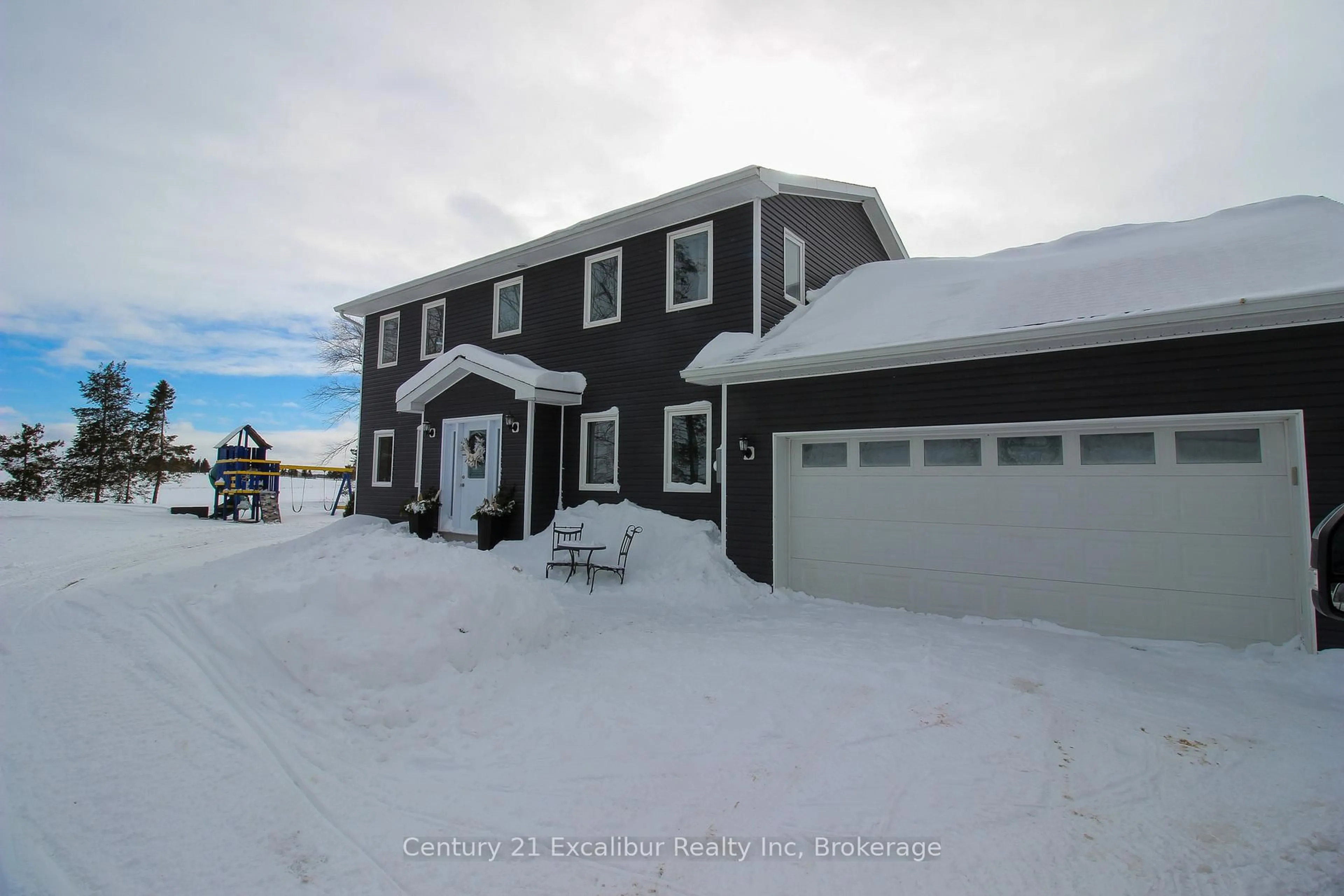 A pic from outside/outdoor area/front of a property/back of a property/a pic from drone, street for 7104 6th Line, Centre Wellington Ontario N0B 1J0