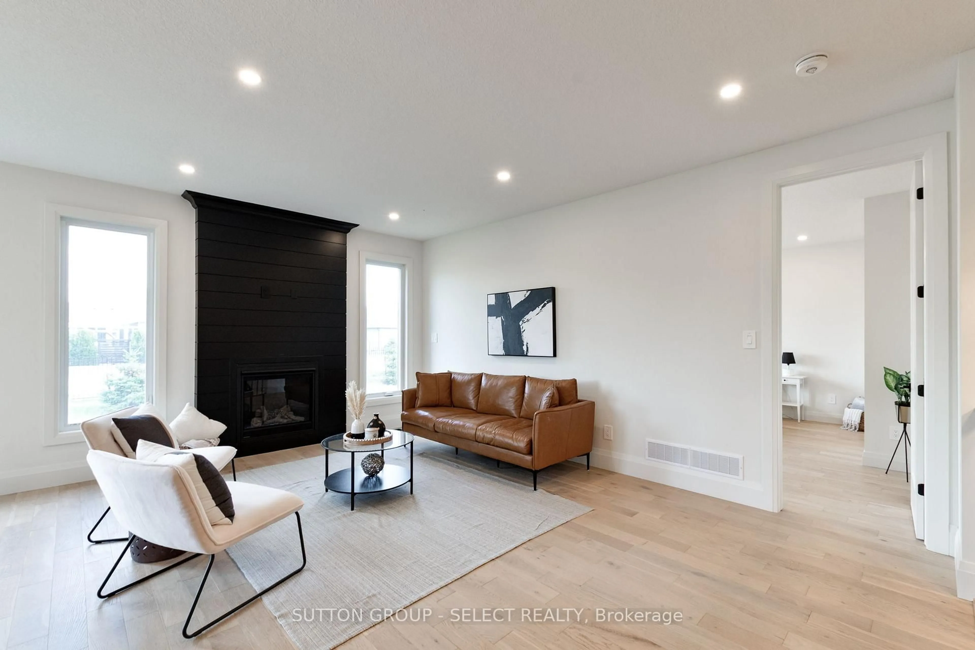 Living room with furniture, wood/laminate floor for 16 KELLY Dr, Zorra Ontario N0M 2M0