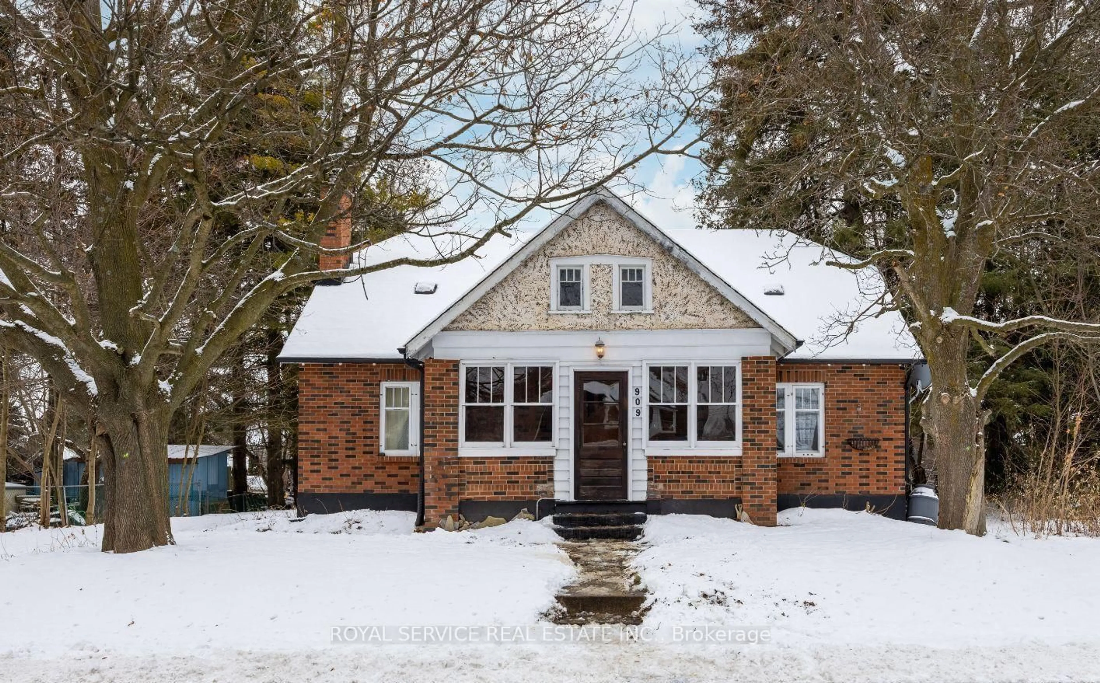 Home with brick exterior material, street for 909 7A Highway, Cavan Monaghan Ontario L0A 1C0