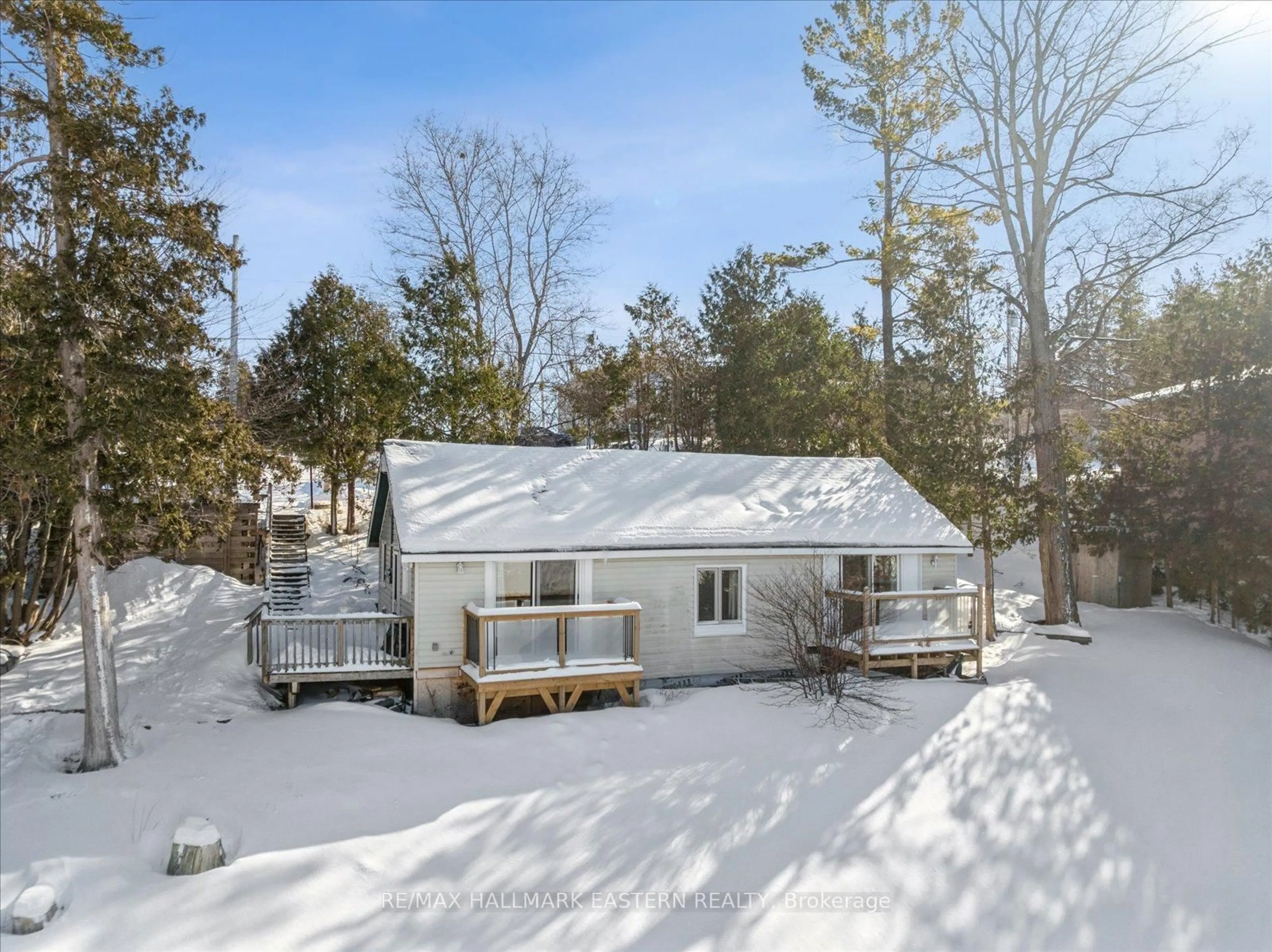 A pic from outside/outdoor area/front of a property/back of a property/a pic from drone, forest/trees view for 344 Fife Ave, Selwyn Ontario K9J 6X3