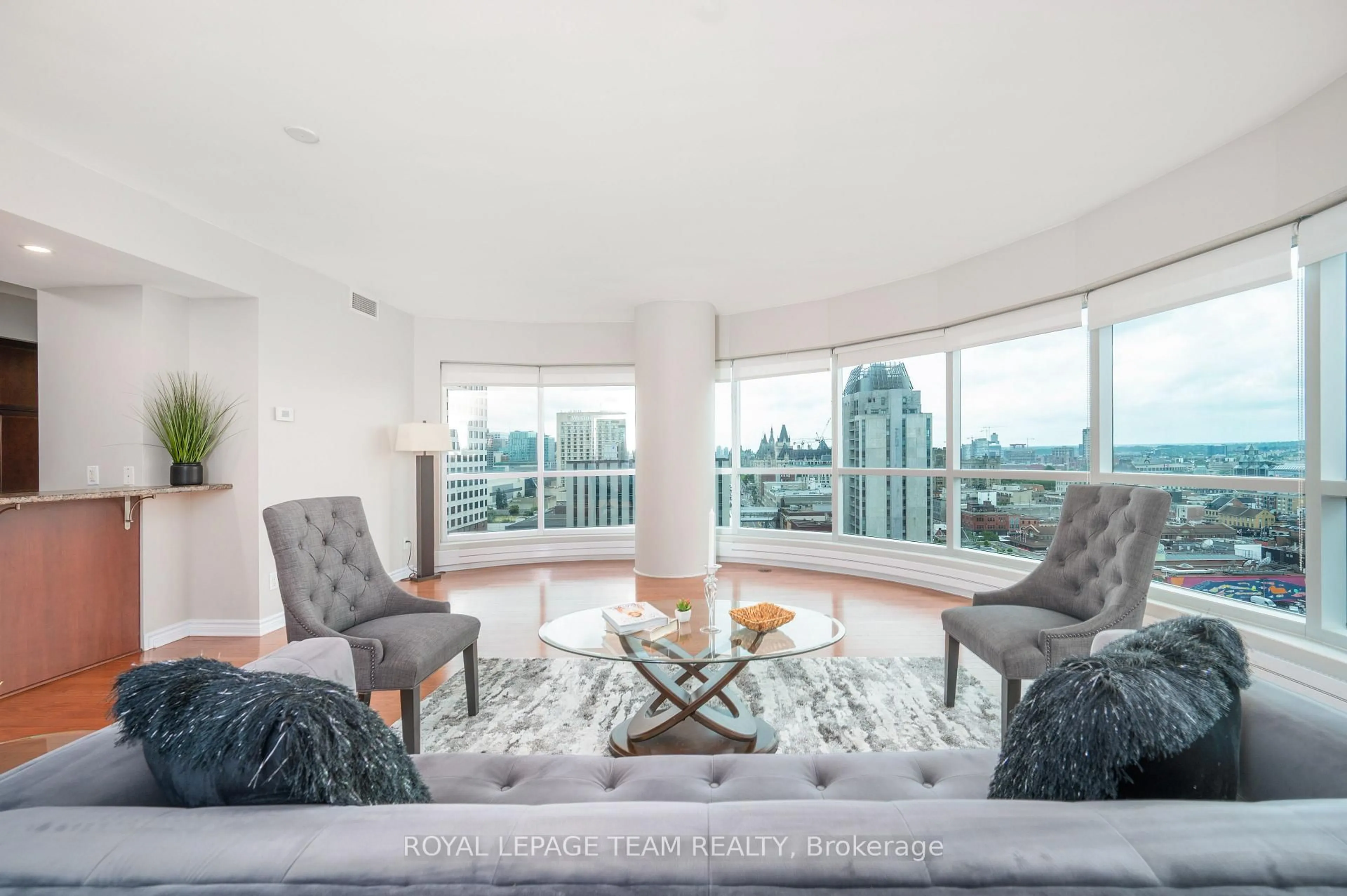 Living room with furniture, unknown for 200 Rideau St #1704, Ottawa Ontario K1N 5Y1