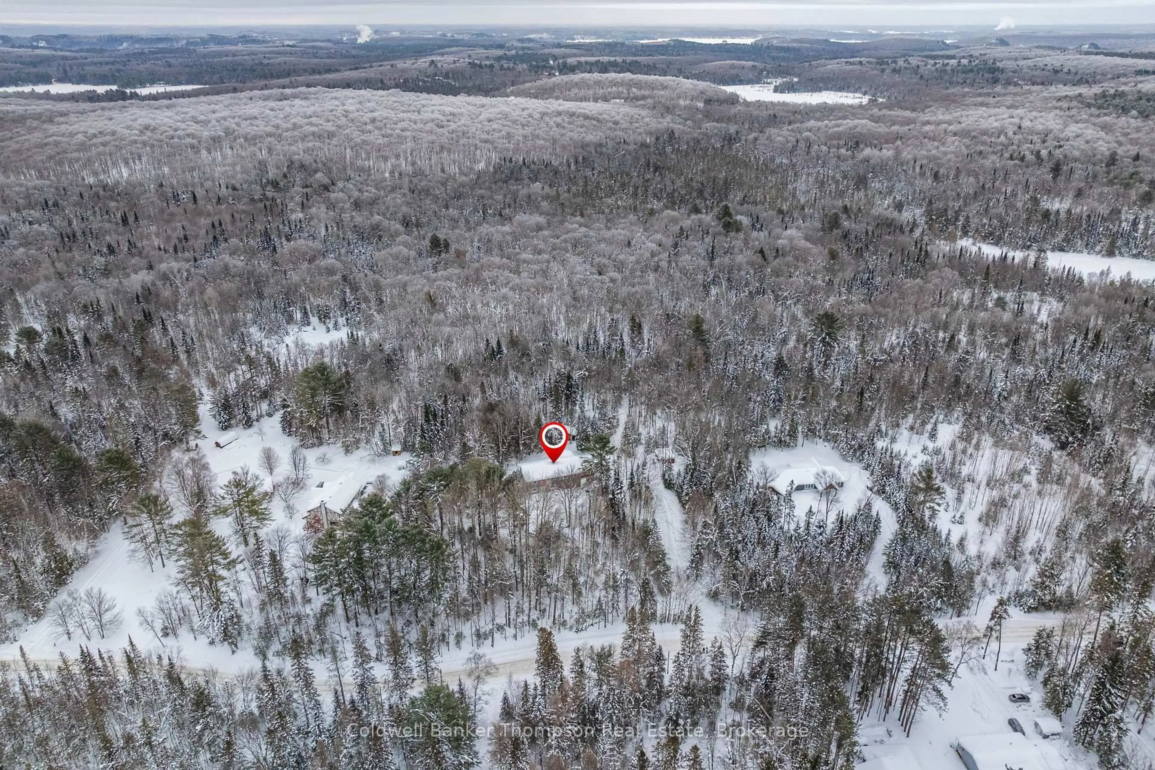 A pic from outside/outdoor area/front of a property/back of a property/a pic from drone, forest/trees view for 1039 South Waseosa Lake Rd, Huntsville Ontario P1H 2N5