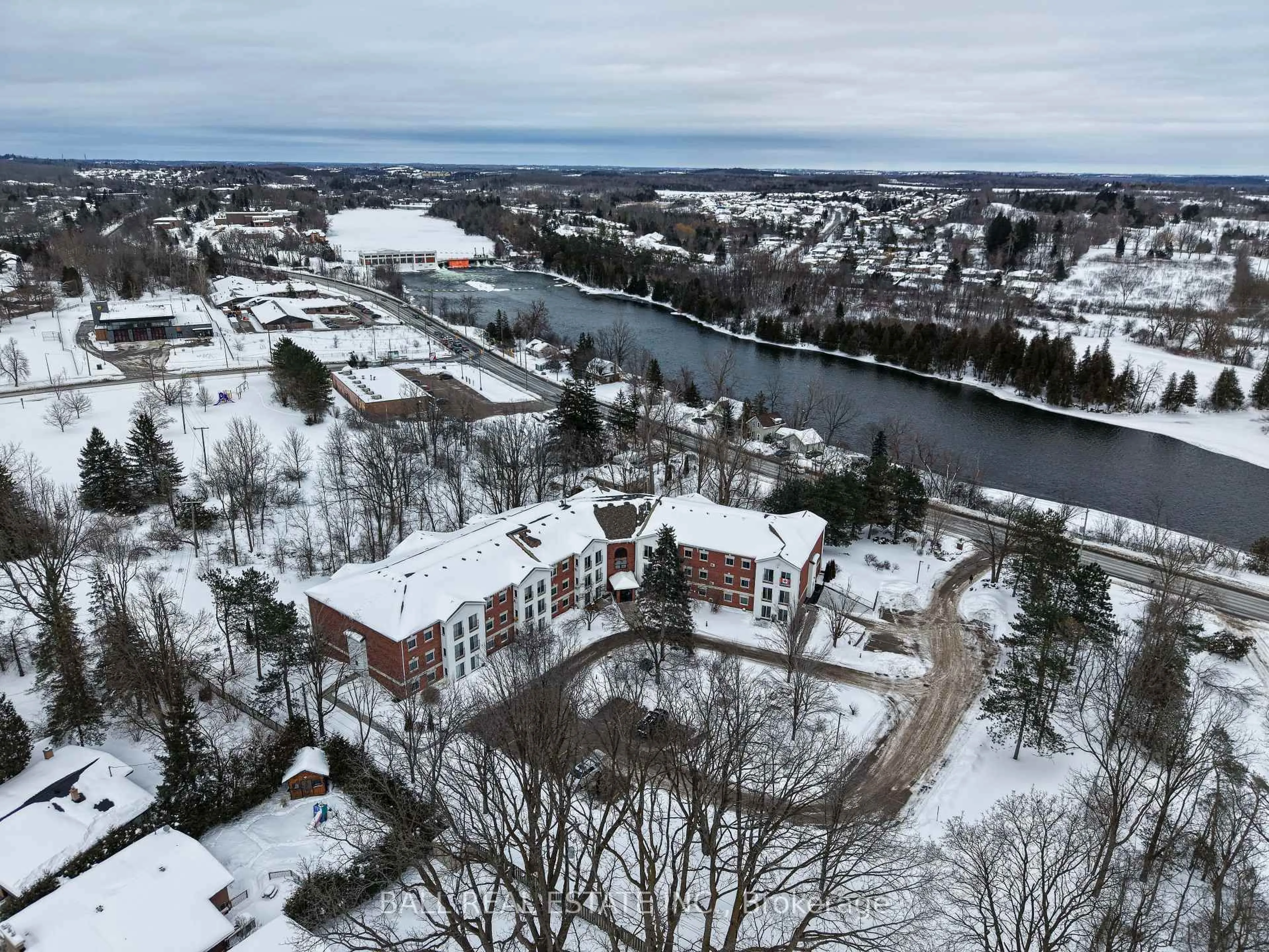 A pic from outside/outdoor area/front of a property/back of a property/a pic from drone, water/lake/river/ocean view for 1111 Water St #309, Peterborough Ontario K9H 3P7