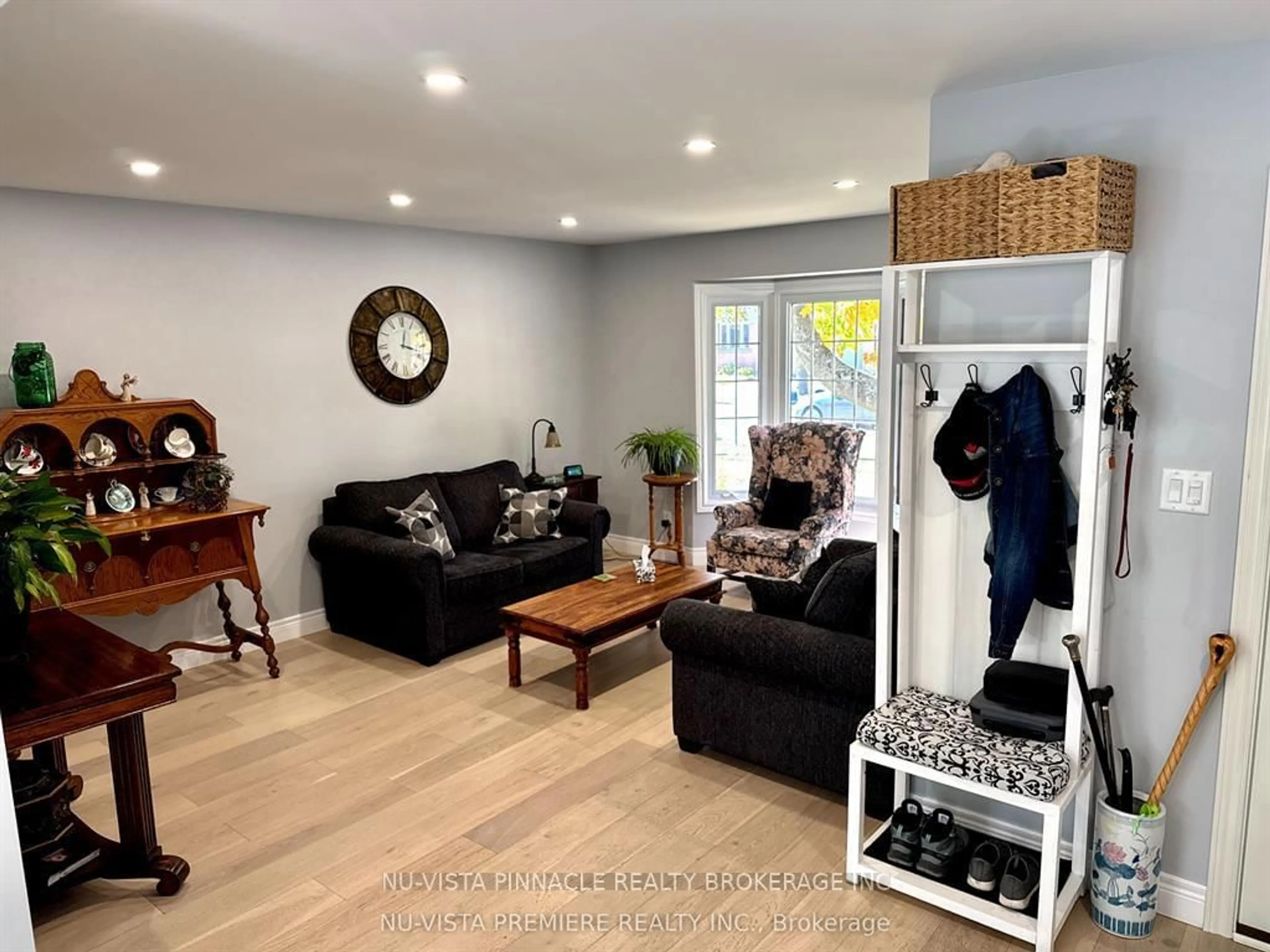 Living room with furniture, wood/laminate floor for 1446 Aldersbrook Rd, London North Ontario N6G 3V7