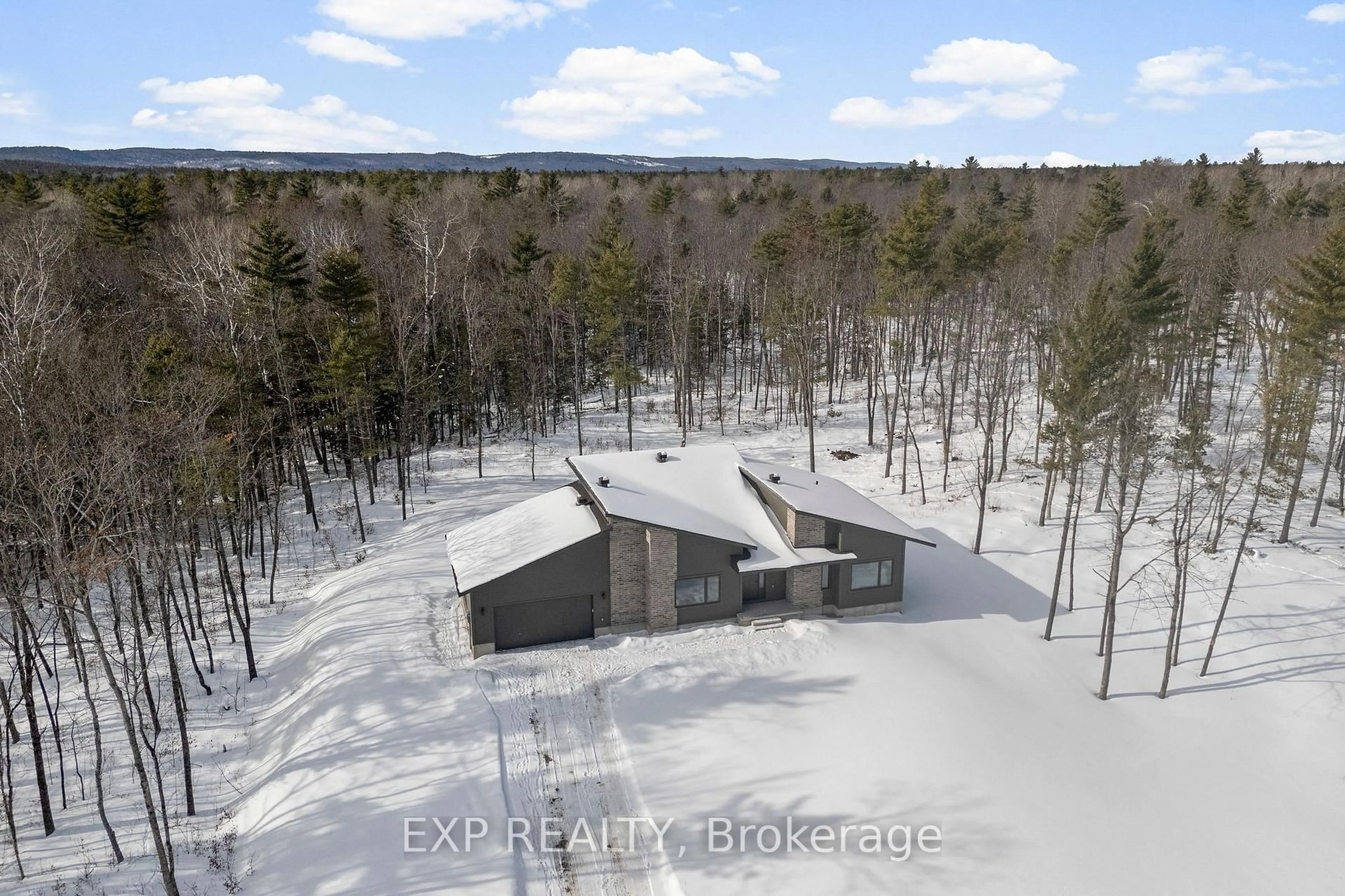 A pic from outside/outdoor area/front of a property/back of a property/a pic from drone, forest/trees view for 57 Longleaf Way, Calabogie Ontario K0J 1H0
