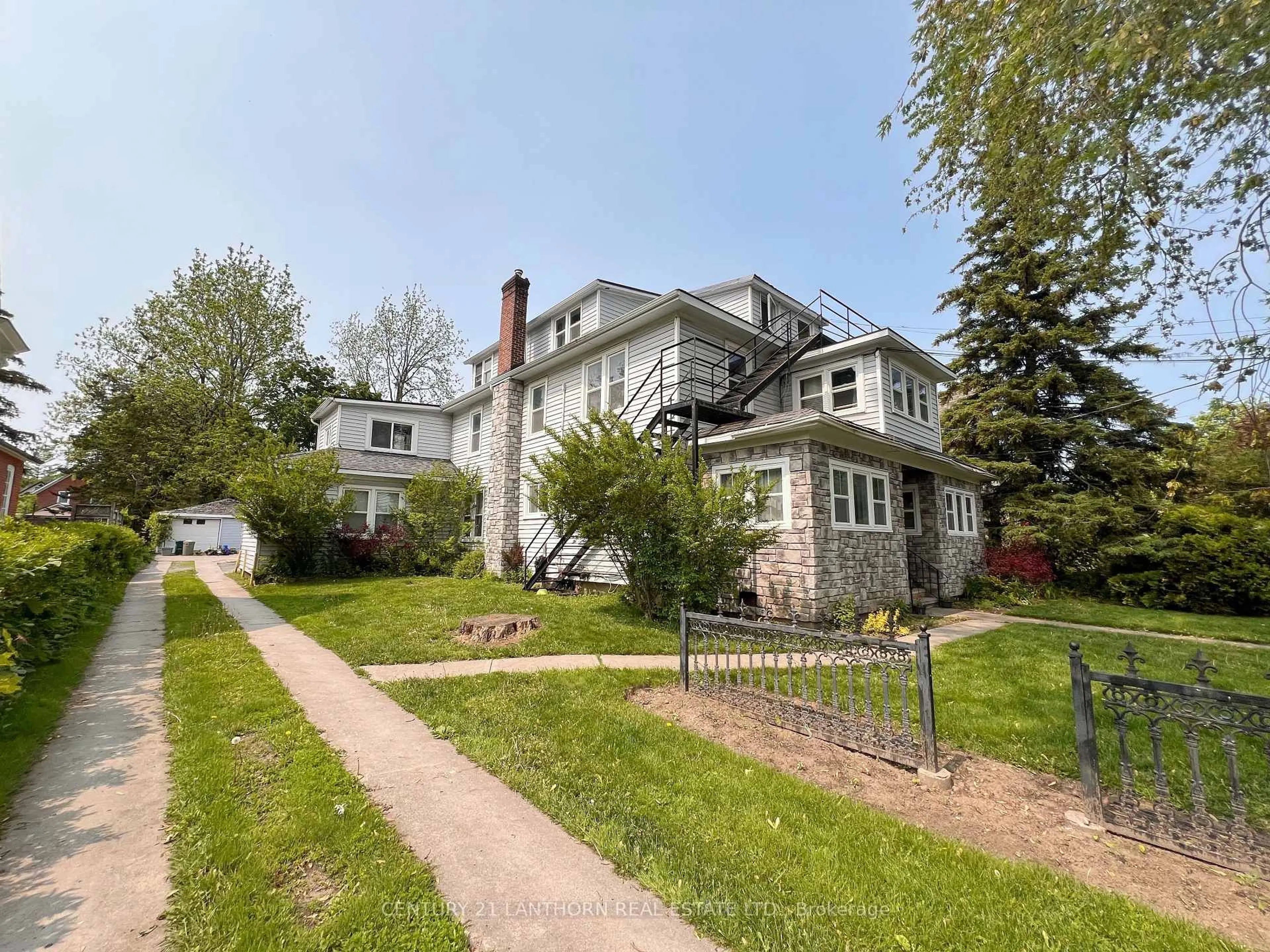 A pic from outside/outdoor area/front of a property/back of a property/a pic from drone, street for 47 King St, Prince Edward County Ontario K0K 2T0