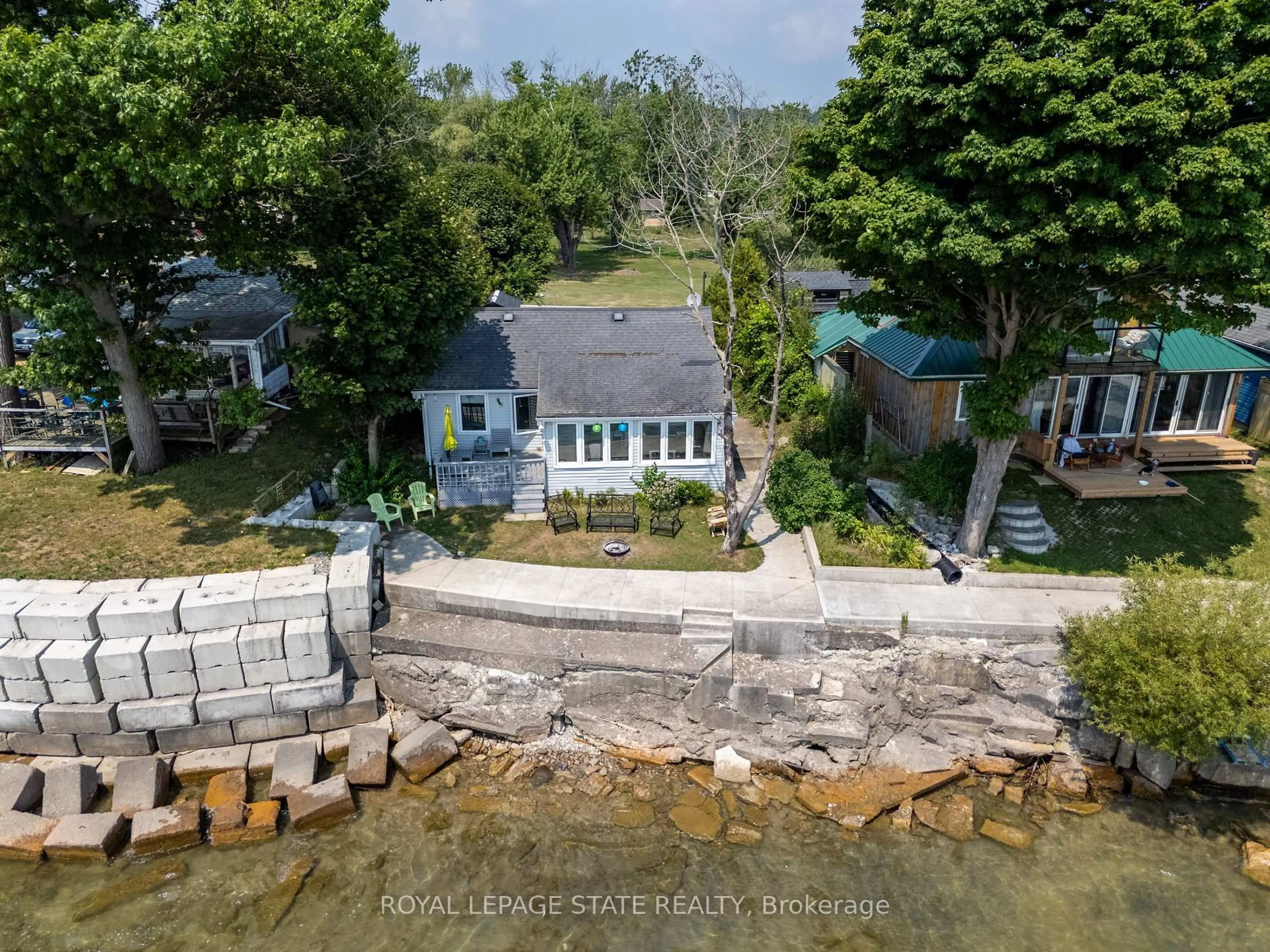 A pic from outside/outdoor area/front of a property/back of a property/a pic from drone, water/lake/river/ocean view for 2110 Lakeshore Rd, Haldimand Ontario N1A 2W8