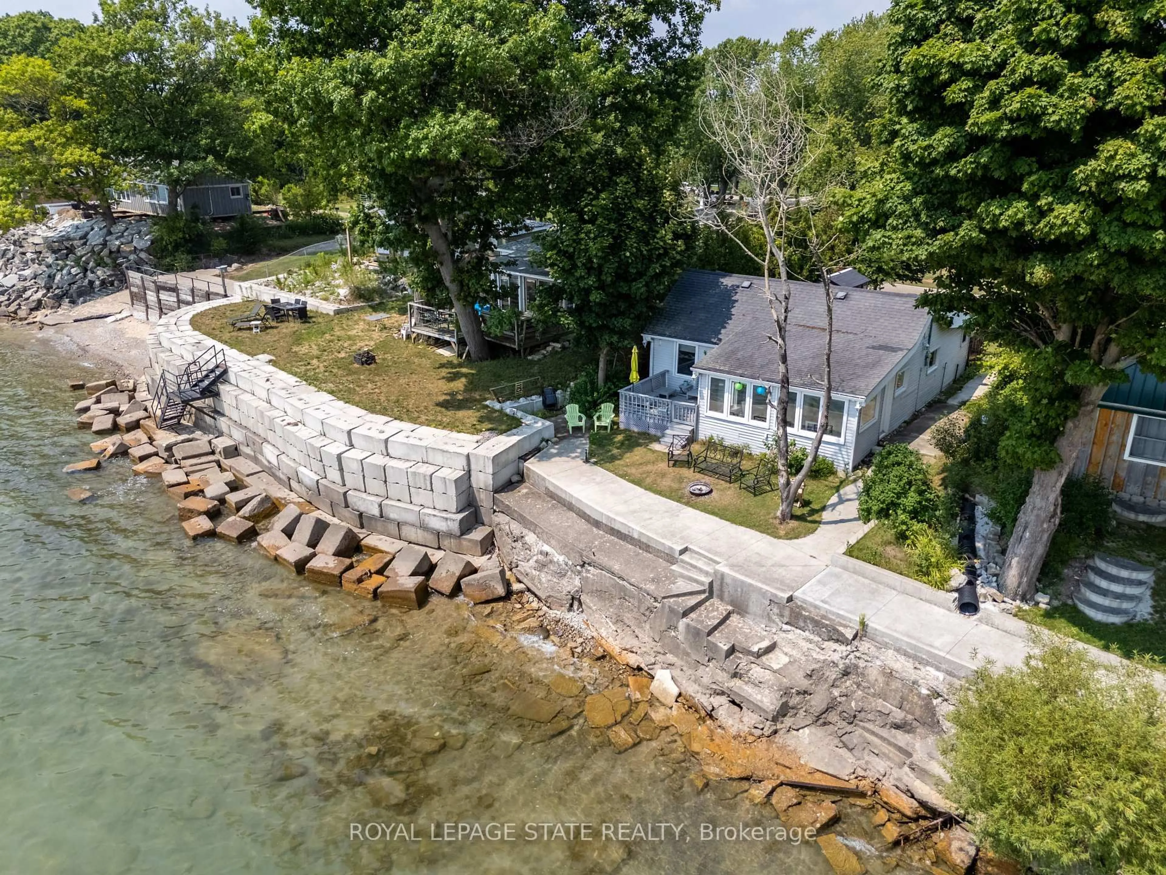 A pic from outside/outdoor area/front of a property/back of a property/a pic from drone, water/lake/river/ocean view for 2110 Lakeshore Rd, Haldimand Ontario N1A 2W8