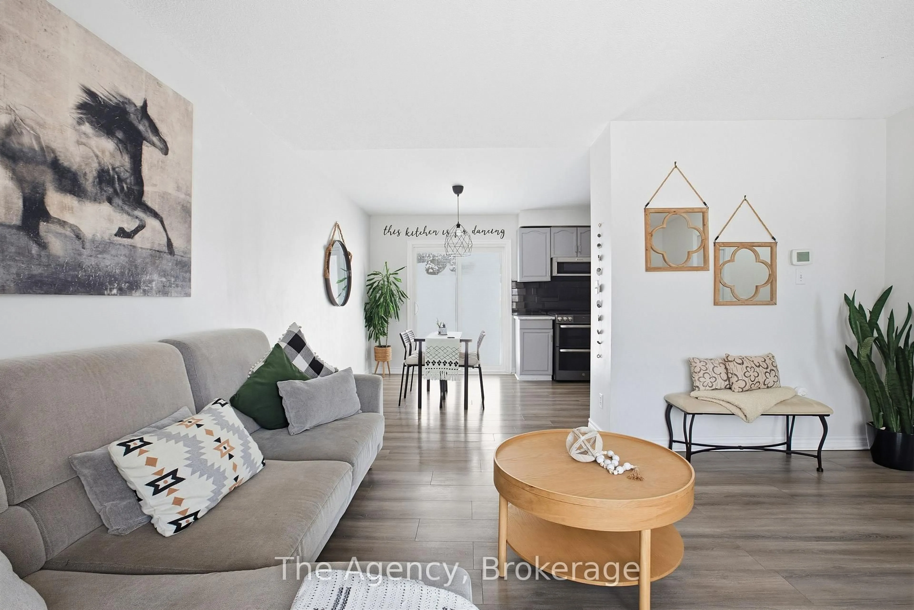 Living room with furniture, wood/laminate floor for 110 Leeson St, East Luther Grand Valley Ontario L0N 1G0