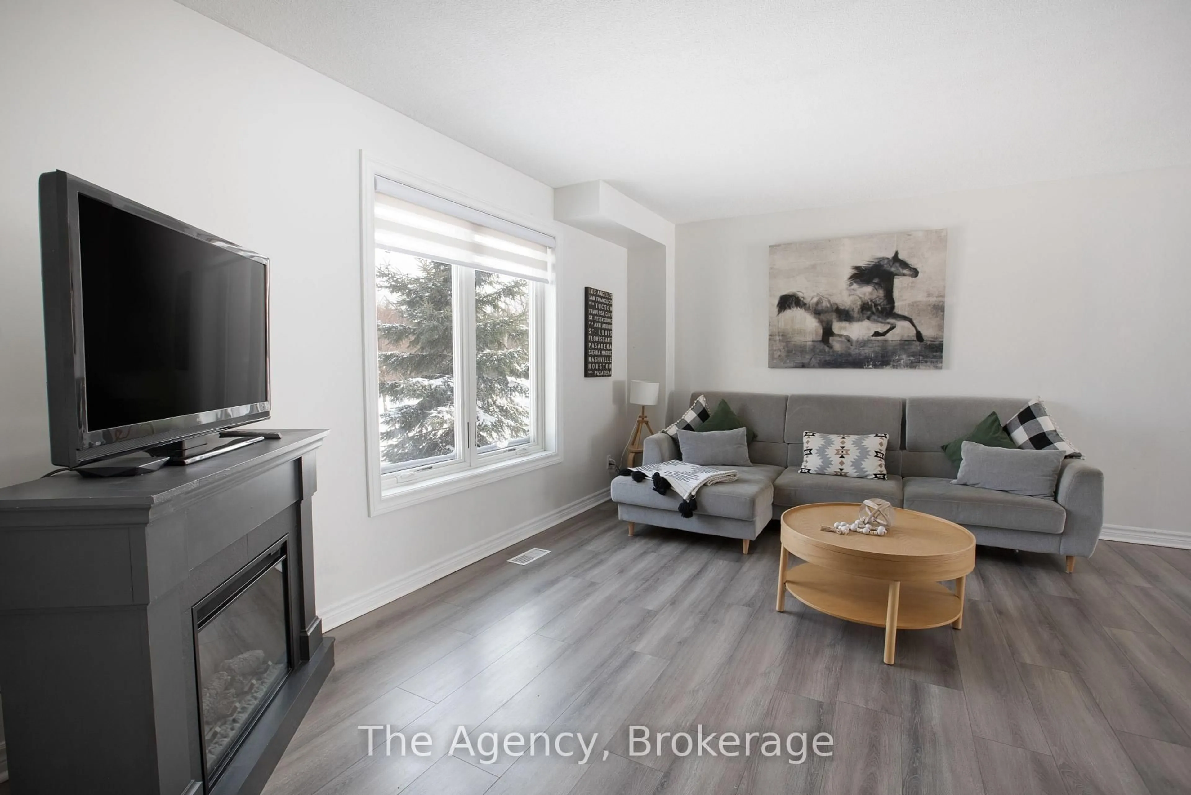 Living room with furniture, wood/laminate floor for 110 Leeson St, East Luther Grand Valley Ontario L0N 1G0