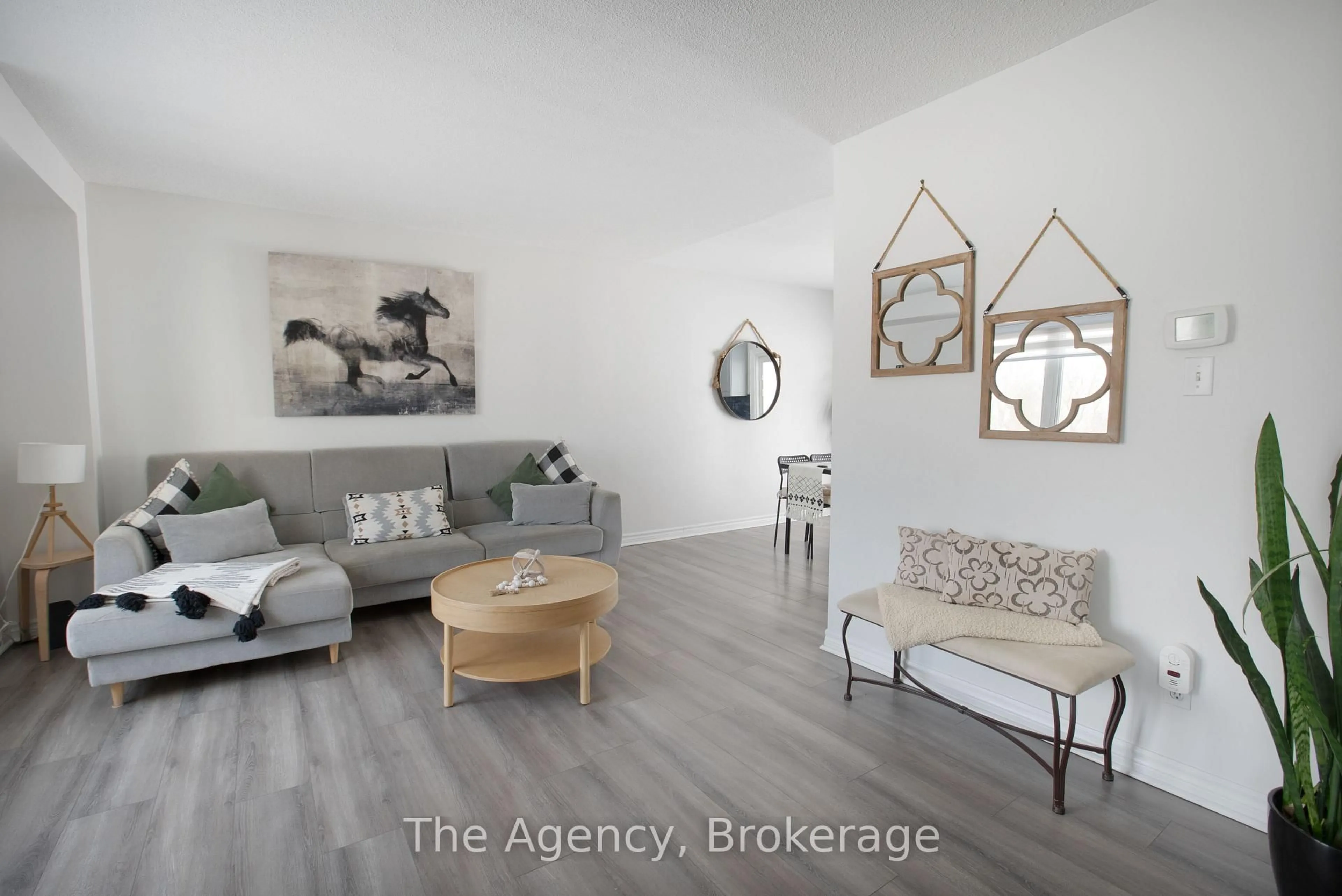 Living room with furniture, wood/laminate floor for 110 Leeson St, East Luther Grand Valley Ontario L0N 1G0