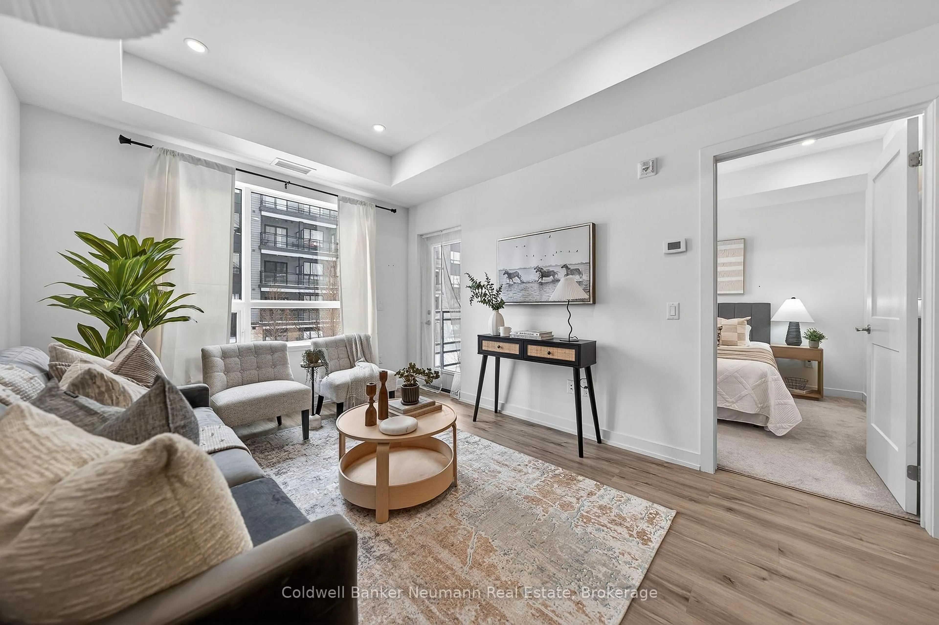 Living room with furniture, unknown for 247 Northfield Dr #210, Waterloo Ontario N2K 0H1