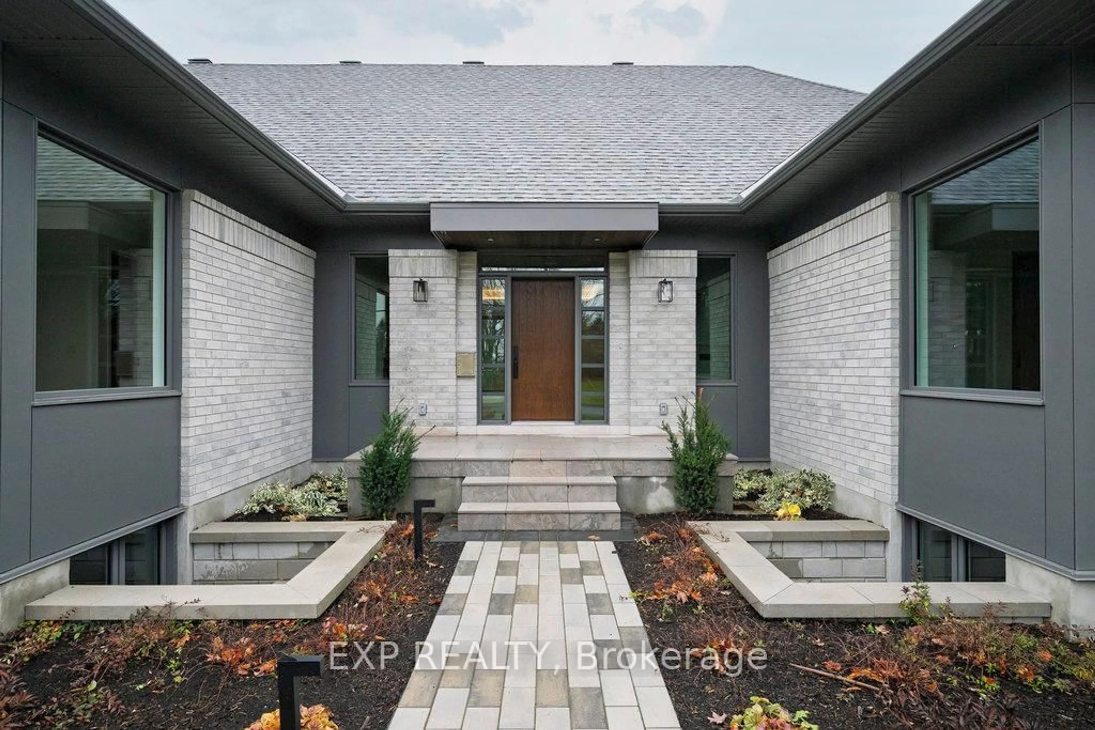 Home with brick exterior material, street for 26 Clovelly Rd, Ottawa Ontario K1J 6M2