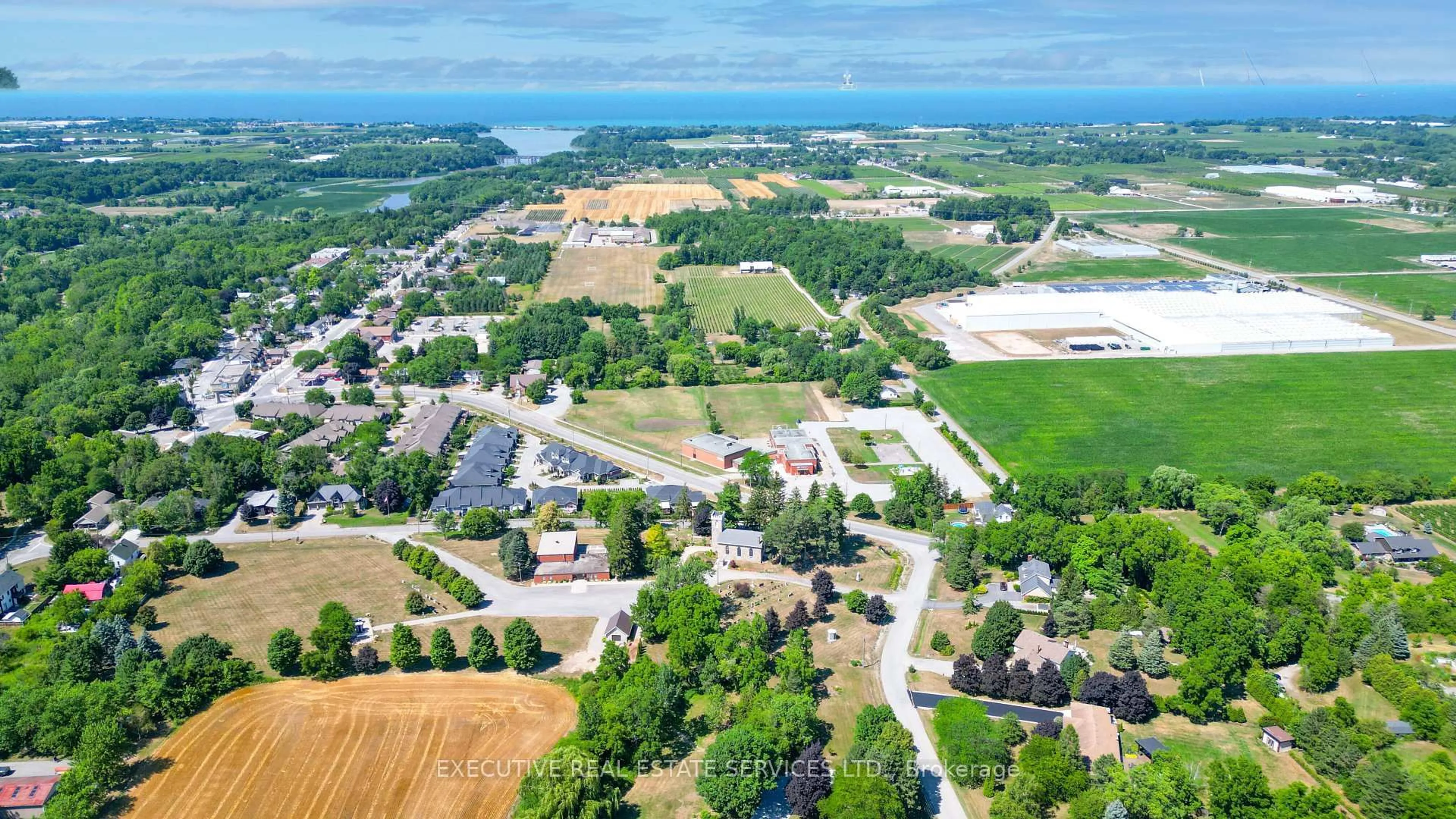 A pic from outside/outdoor area/front of a property/back of a property/a pic from drone, water/lake/river/ocean view for 2848 King St #11, Lincoln Ontario L0R 1S0