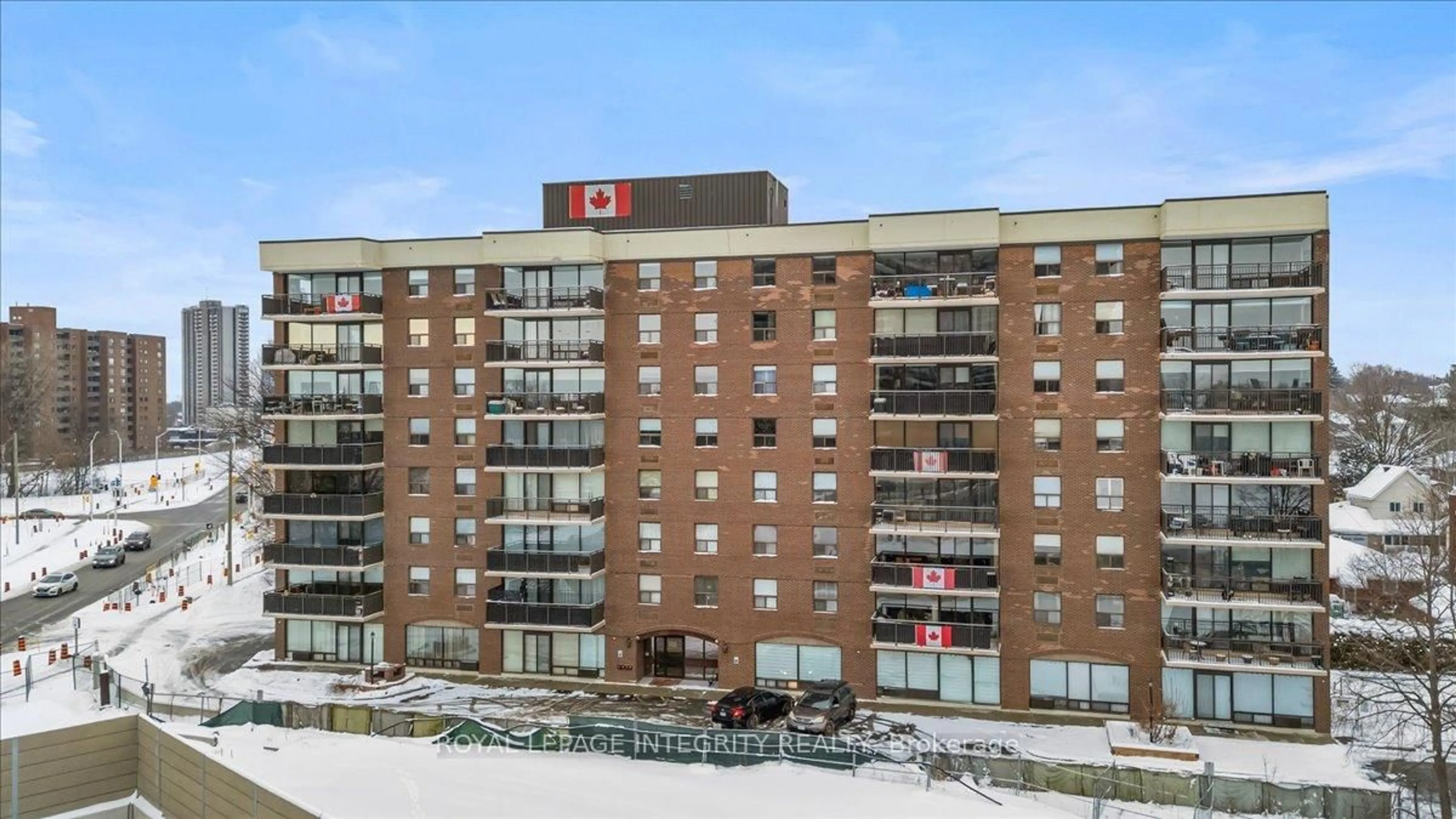 A pic from outside/outdoor area/front of a property/back of a property/a pic from drone, building for 1190 Richmond Rd #703, Ottawa Ontario K2B 8J3