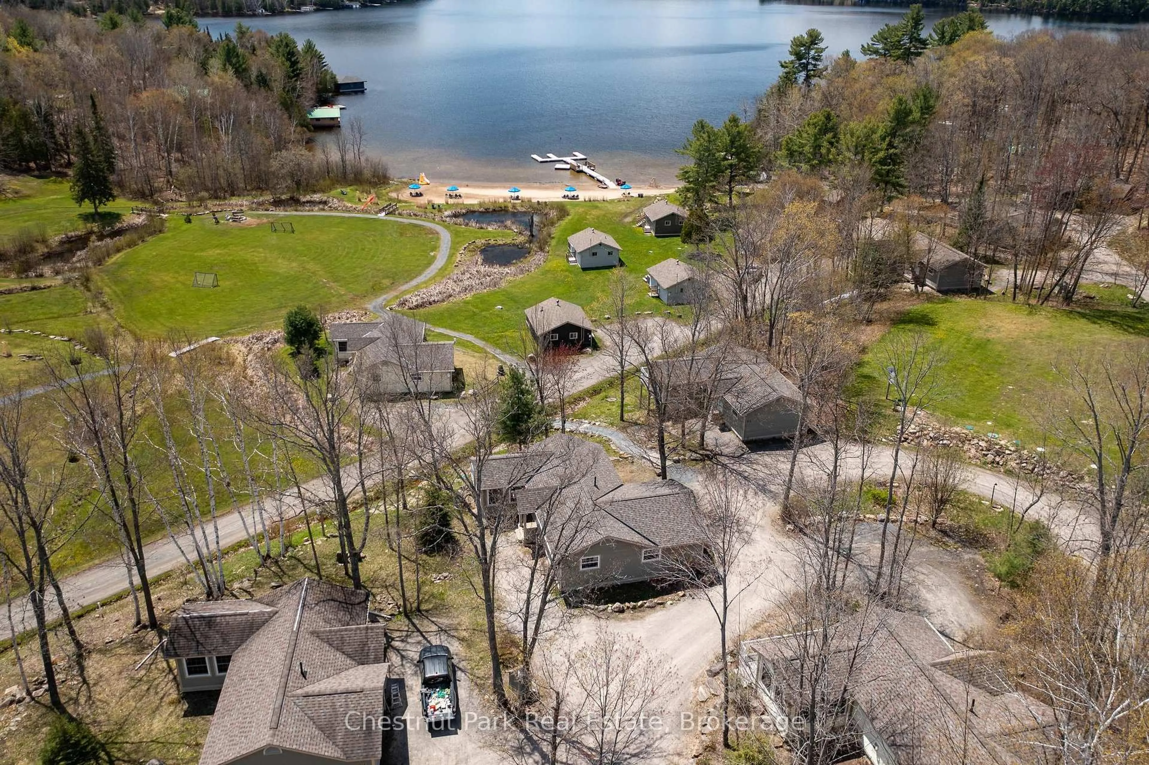 A pic from outside/outdoor area/front of a property/back of a property/a pic from drone, water/lake/river/ocean view for 1052 RAT BAY Rd #112-8, Lake of Bays Ontario P1H 2J6