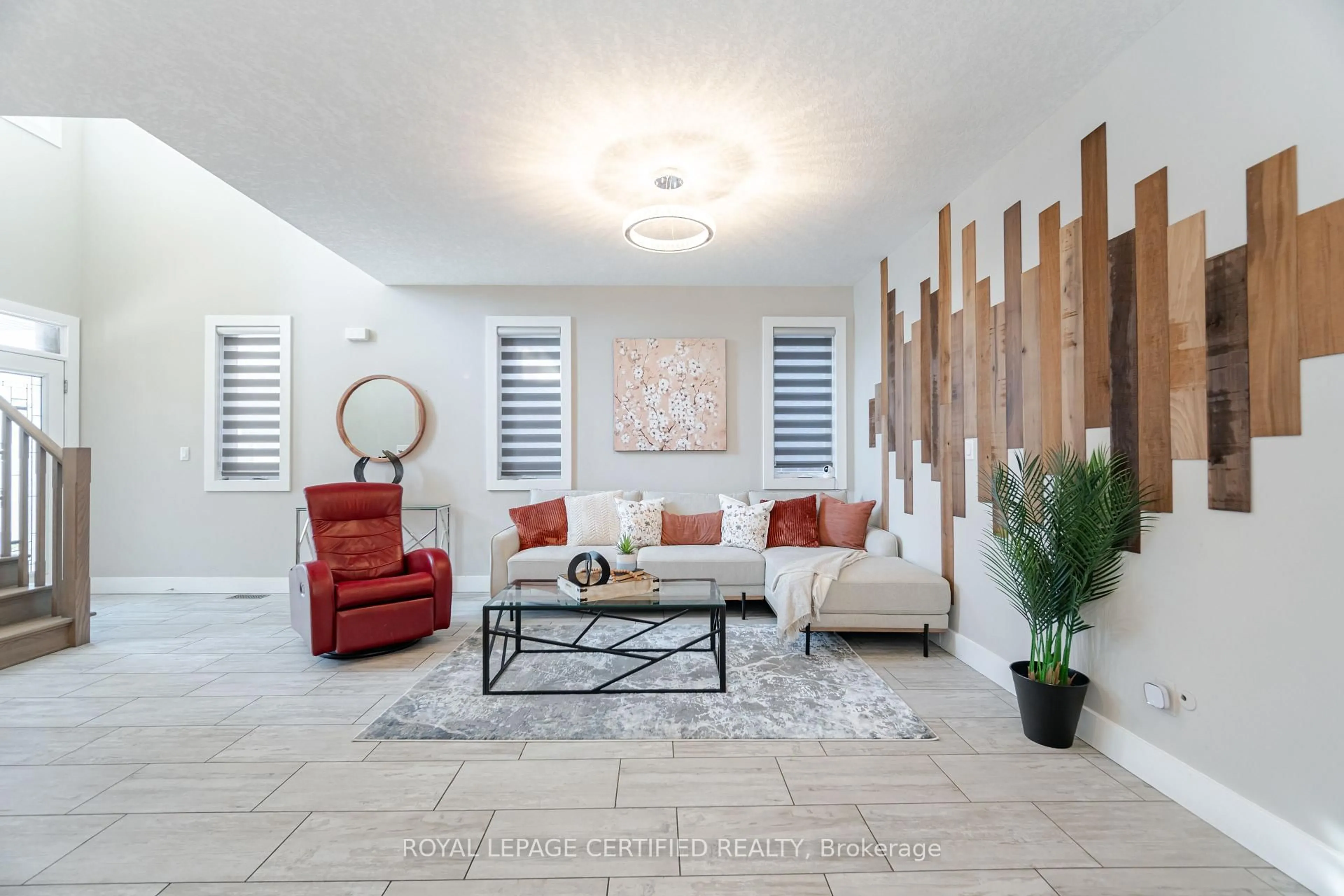 Living room with furniture, ceramic/tile floor for 204 Forest Creek Dr, Kitchener Ontario N2P 2R3