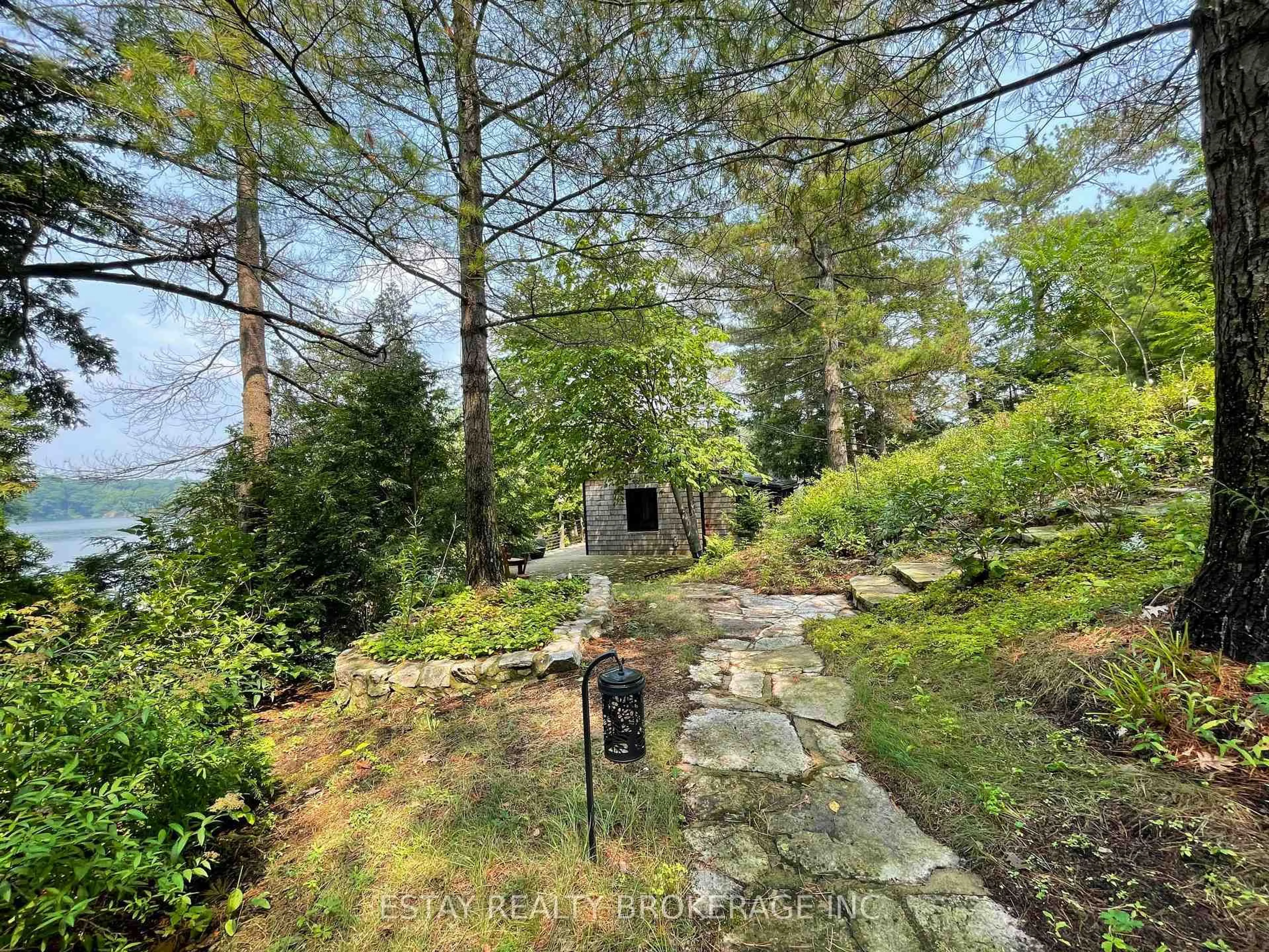 A pic from outside/outdoor area/front of a property/back of a property/a pic from drone, forest/trees view for 1 Island 60, Lansdowne Ontario K0E 1L0