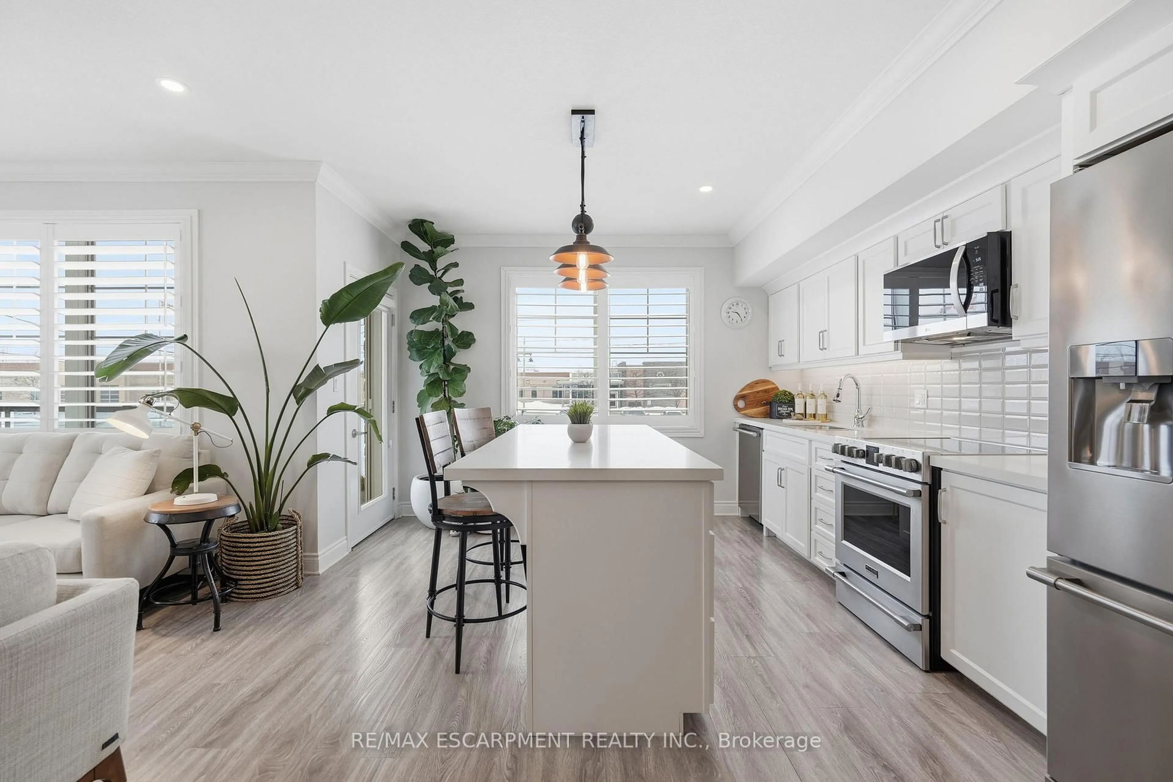 Open concept kitchen, ceramic/tile floor for 65 Haddington St #207, Haldimand Ontario N3W 2H2