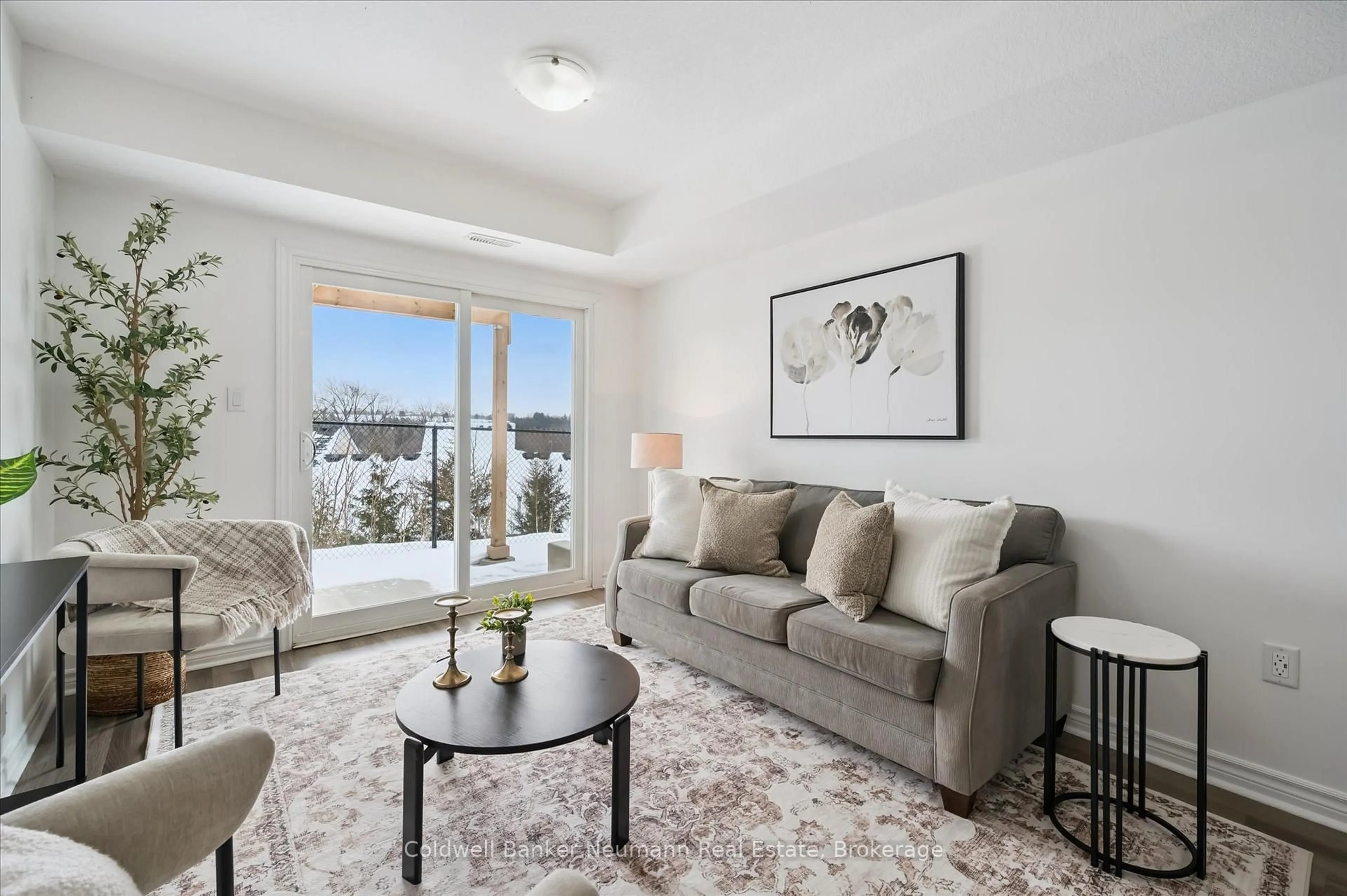 Living room with furniture, unknown for 5 Cityview Dr #103, Guelph Ontario N1E 0R1