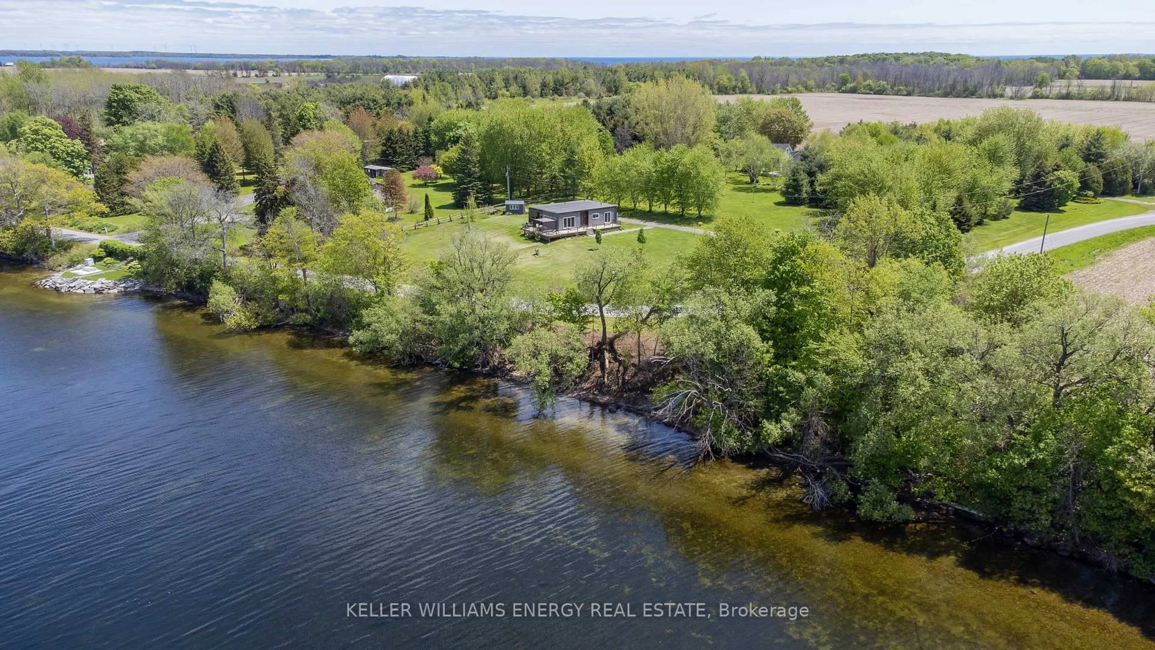 A pic from outside/outdoor area/front of a property/back of a property/a pic from drone, water/lake/river/ocean view for 326 Cressy Bayside Rd, Prince Edward County Ontario K0K 2T0
