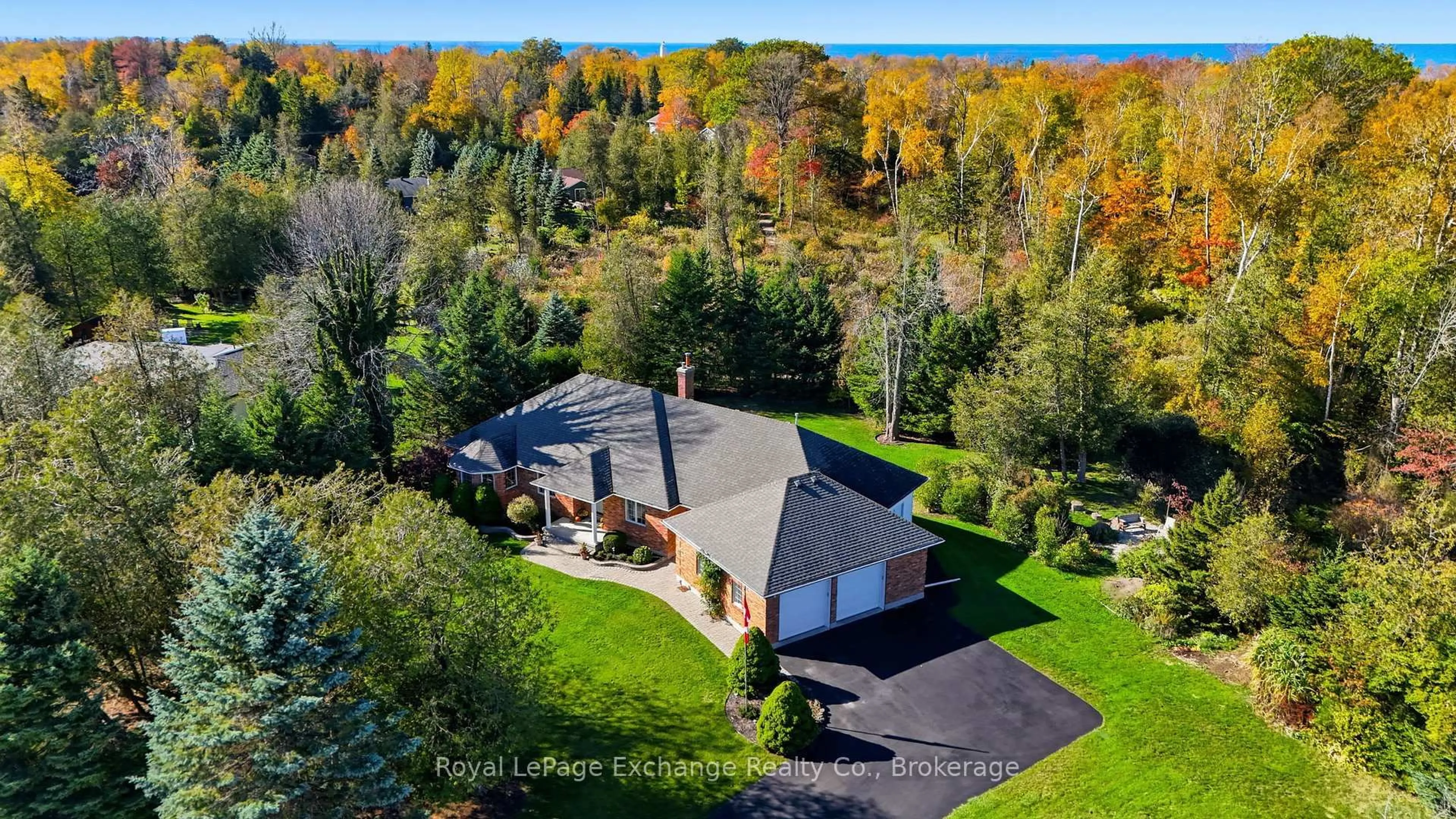 A pic from outside/outdoor area/front of a property/back of a property/a pic from drone, water/lake/river/ocean view for 115 Deerhurst Dr, Huron-Kinloss Ontario N2Z 2X3