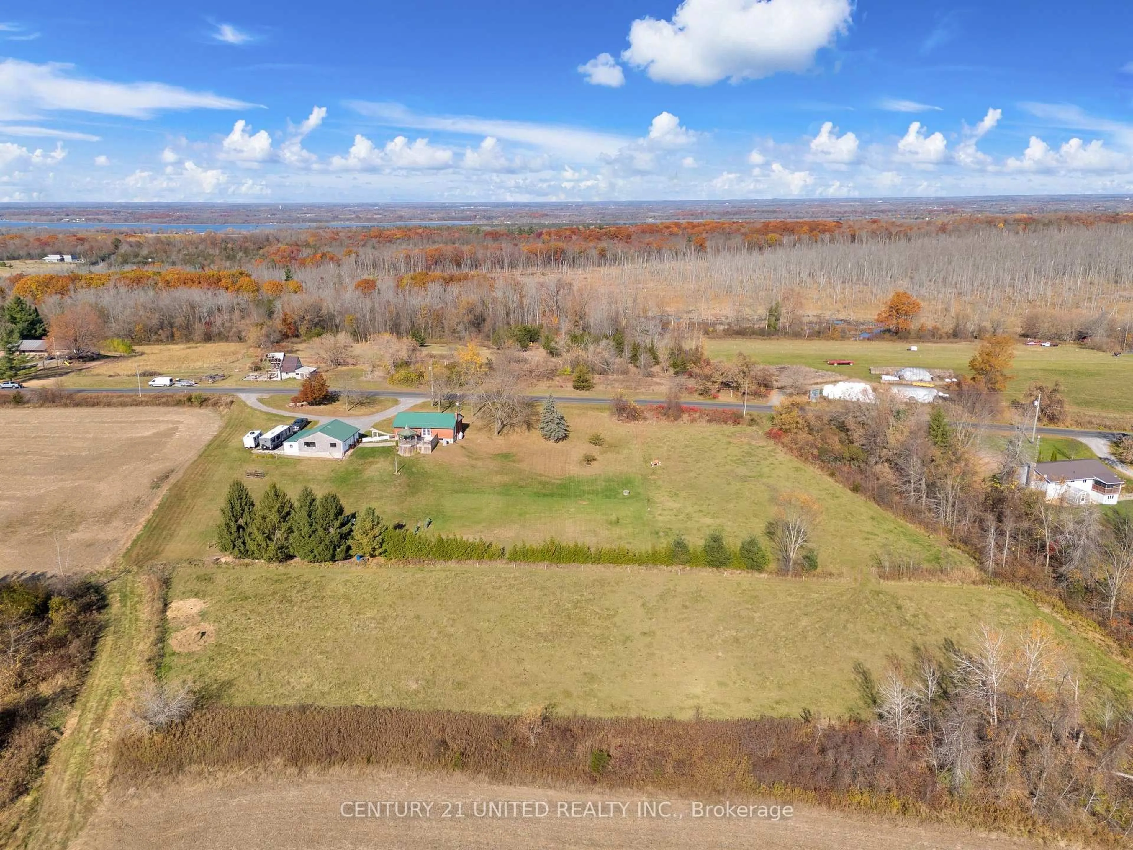 A pic from outside/outdoor area/front of a property/back of a property/a pic from drone, water/lake/river/ocean view for 1976 Fish Lake Rd, Prince Edward County Ontario K0K 1W0