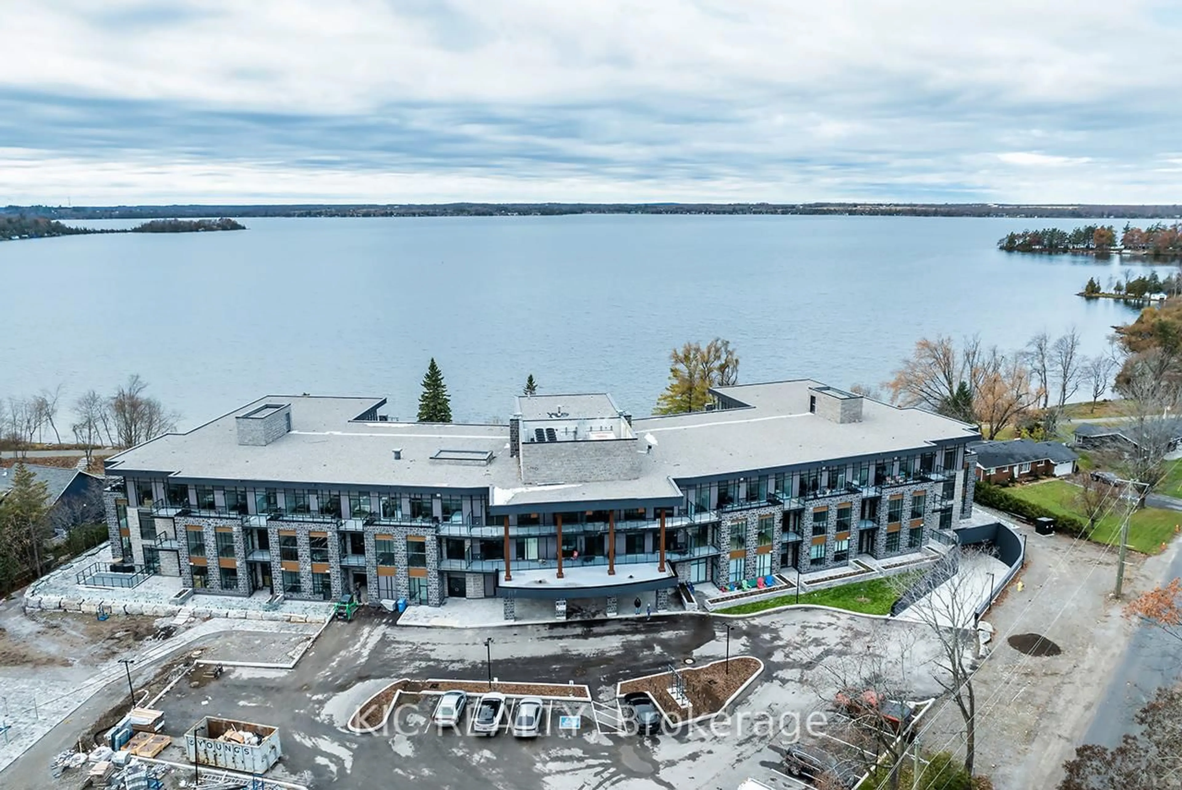 A pic from outside/outdoor area/front of a property/back of a property/a pic from drone, water/lake/river/ocean view for 99 Louisa St #302, Kawartha Lakes Ontario K0M 1N0