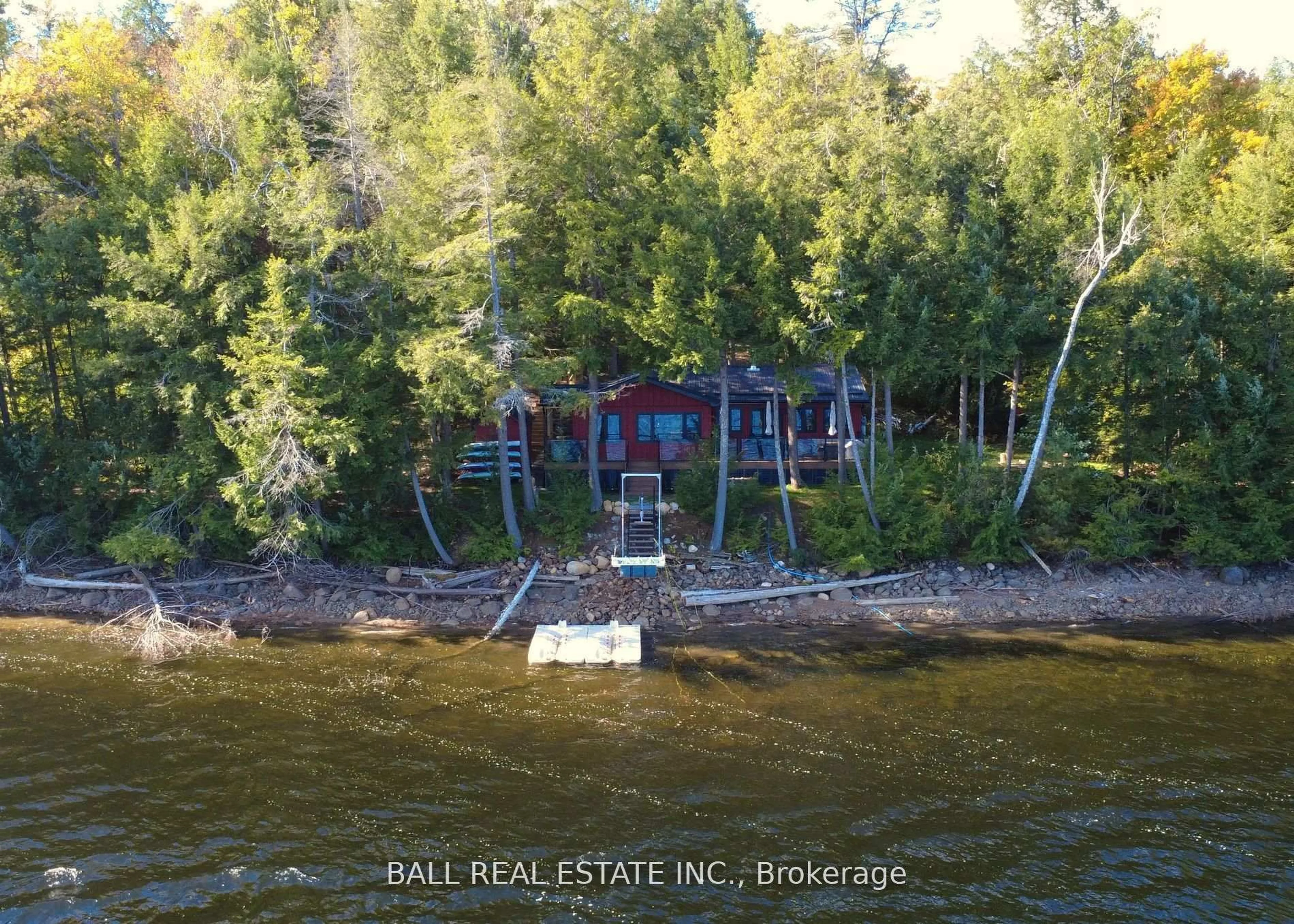 A pic from outside/outdoor area/front of a property/back of a property/a pic from drone, water/lake/river/ocean view for 133 Fire Route 214, Trent Lakes Ontario K0L 1J0