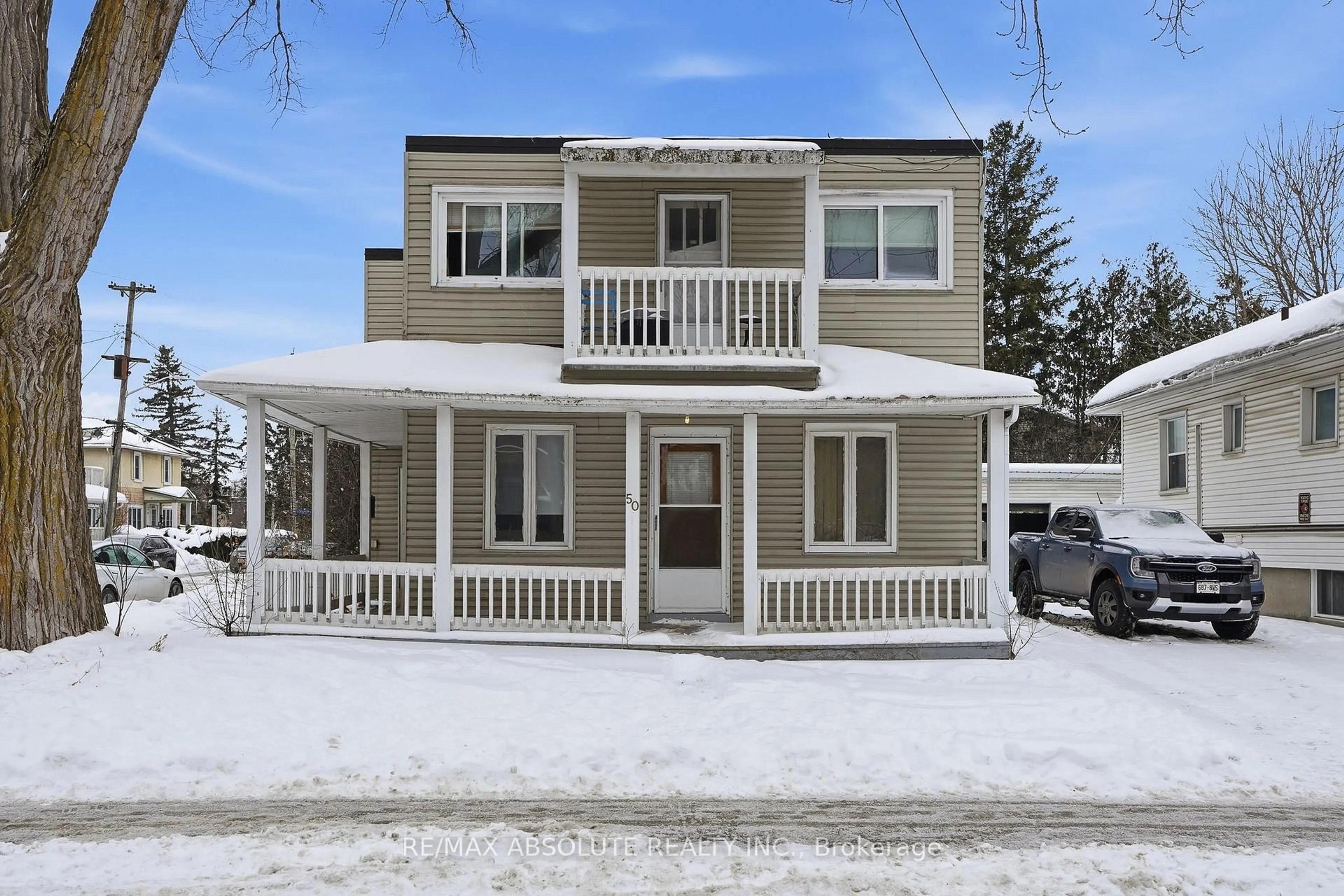 Home with vinyl exterior material, street for 50 Jolliet Ave, Ottawa Ontario K1L 5H5