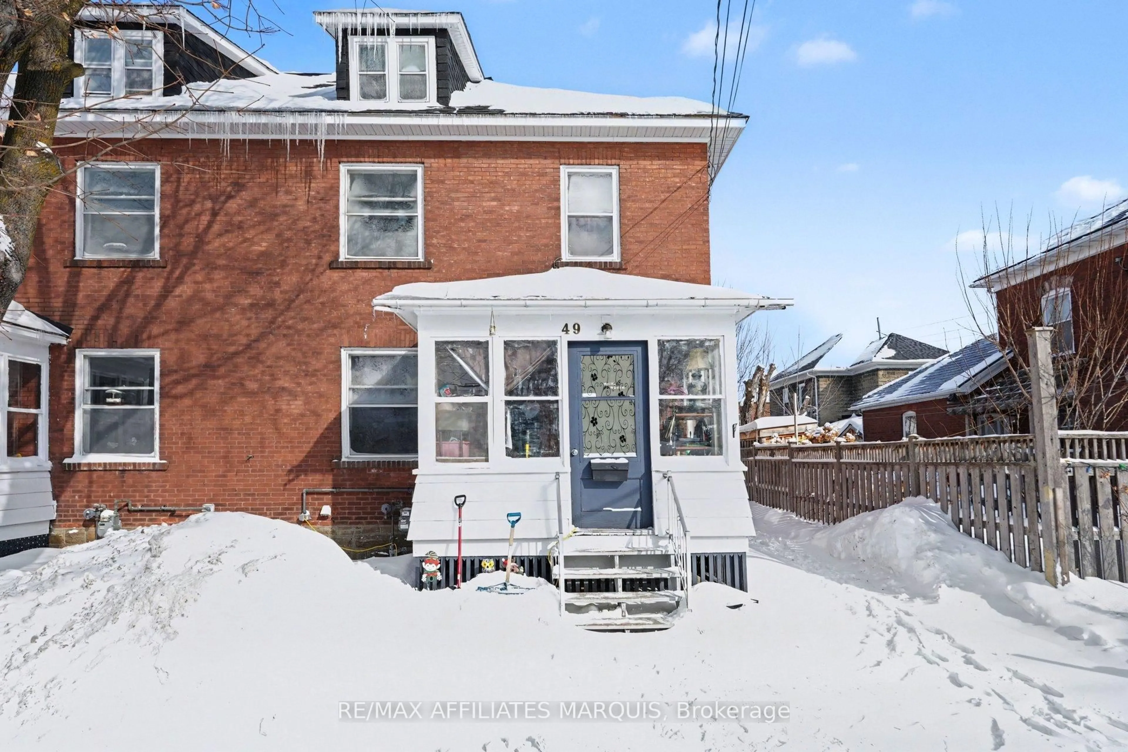 Home with brick exterior material, street for 49-51 McGill St, Smiths Falls Ontario K7A 2J7