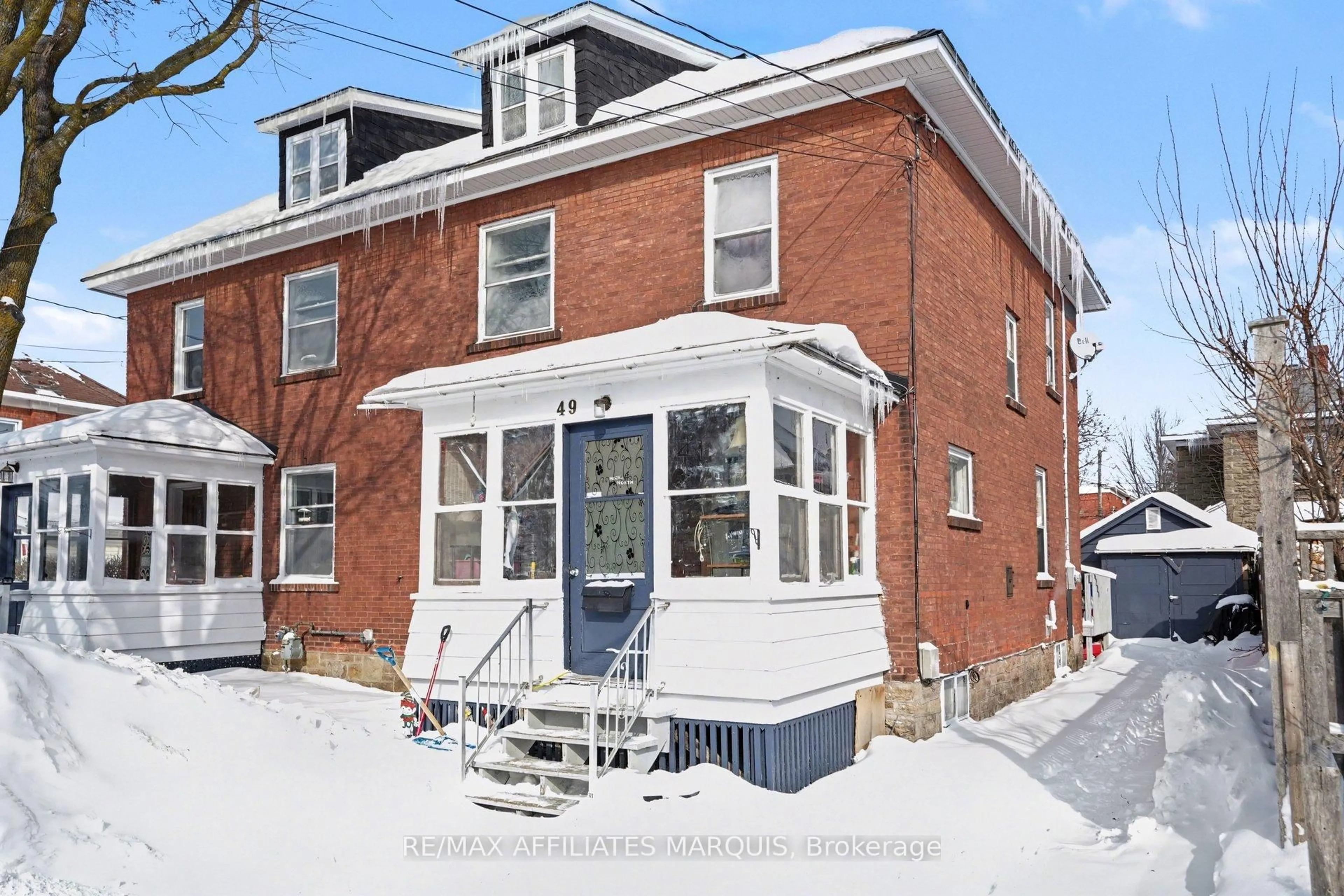 Home with brick exterior material, street for 49-51 McGill St, Smiths Falls Ontario K7A 2J7