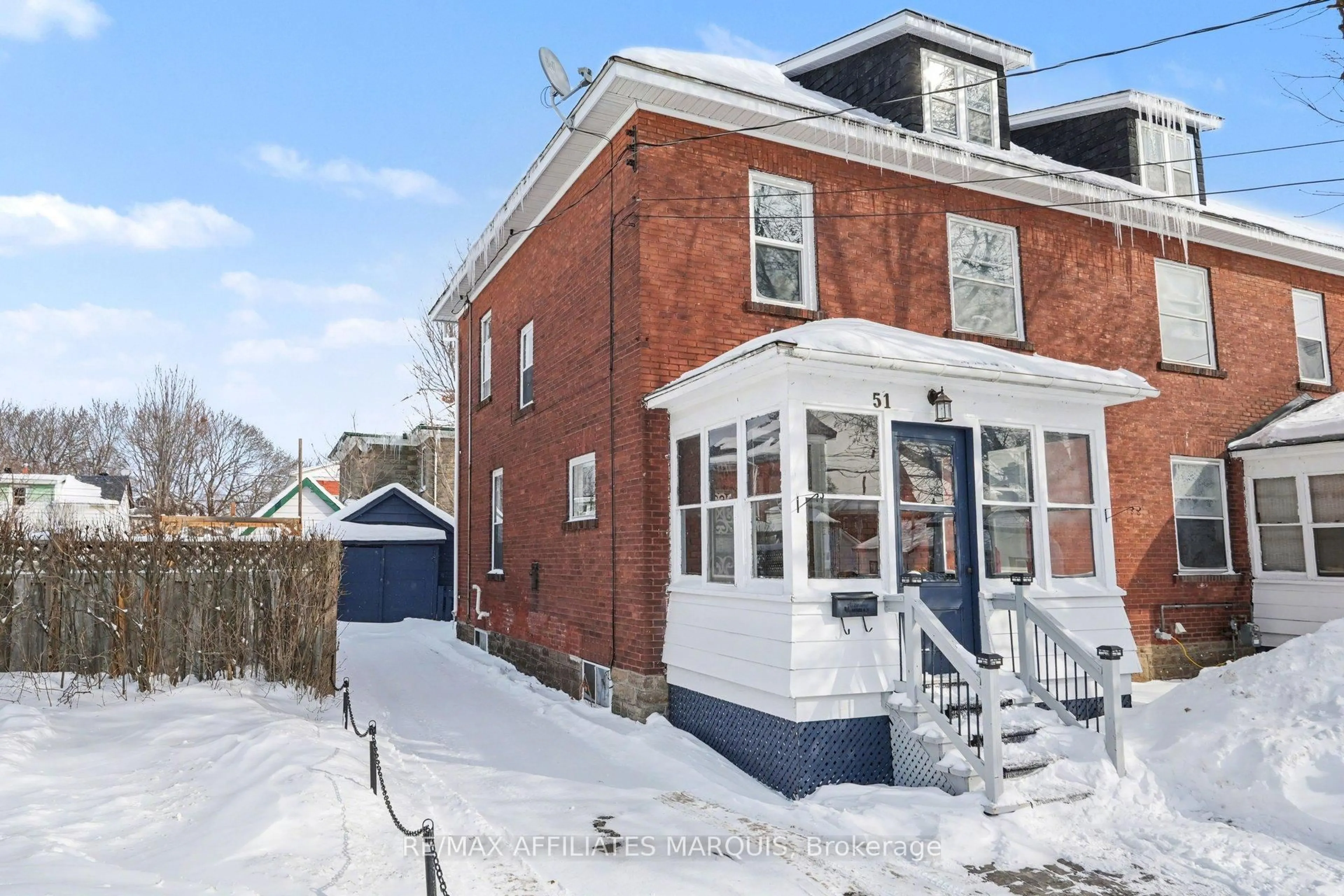 Home with brick exterior material, street for 49-51 McGill St, Smiths Falls Ontario K7A 2J7