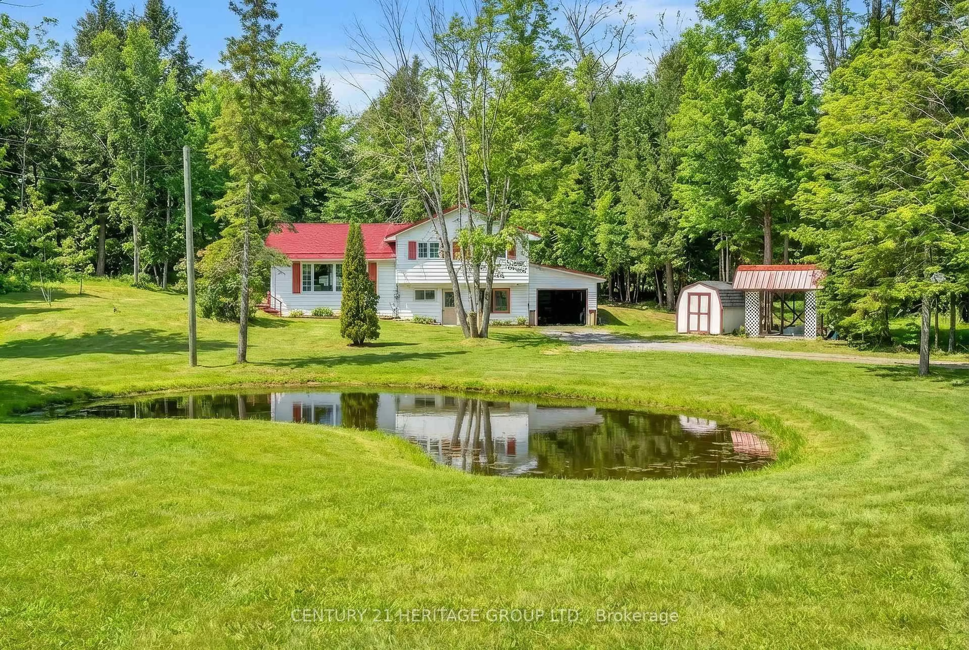 A pic from outside/outdoor area/front of a property/back of a property/a pic from drone, water/lake/river/ocean view for 1715 Highway 118, Bracebridge Ontario P1L 1X1