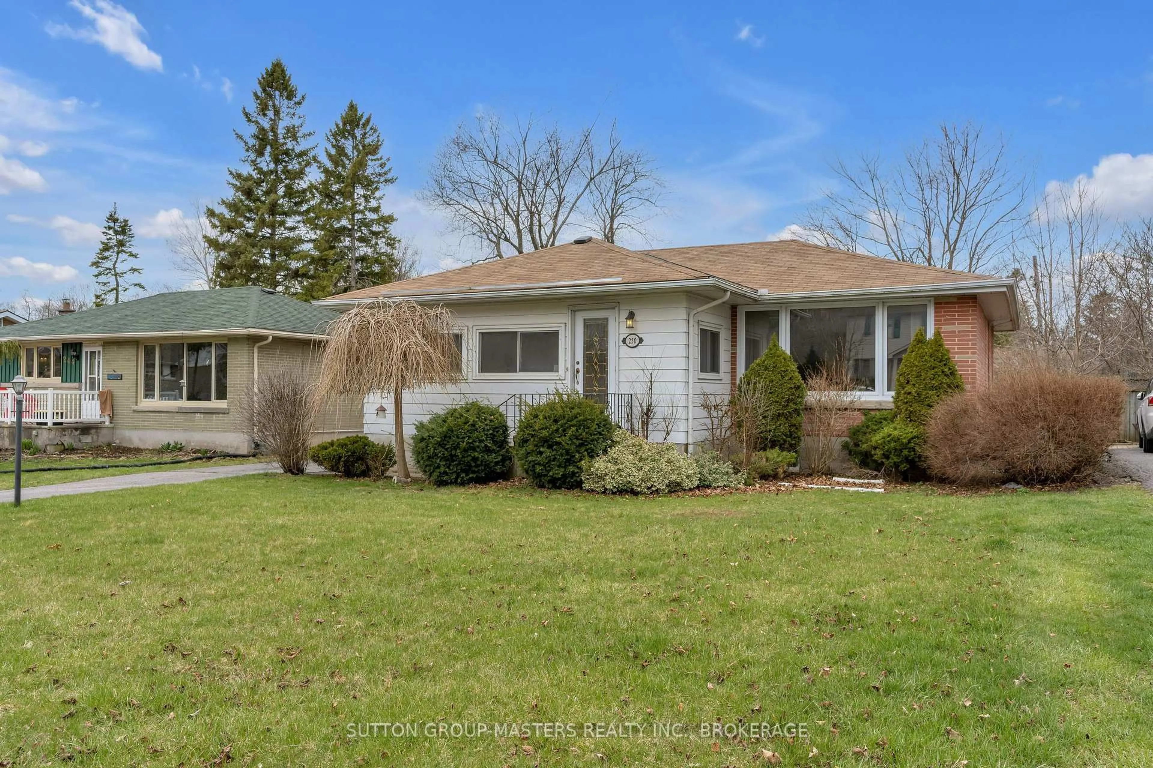 Home with vinyl exterior material, street for 250 Yonge St, Kingston Ontario K7M 1G5