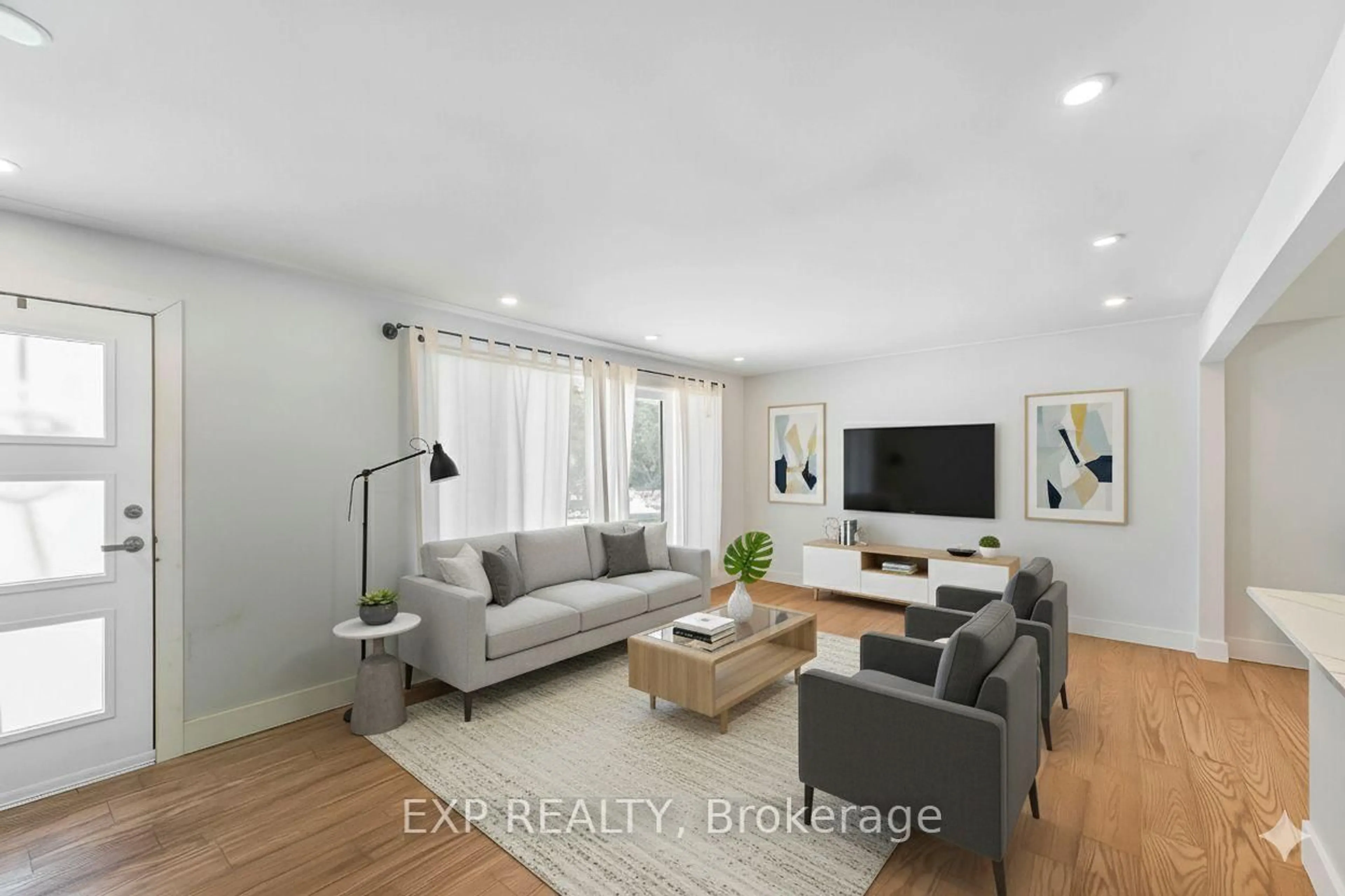 Living room with furniture, wood/laminate floor for 44 Sherry Lane, Nepean Ontario K2G 3L8