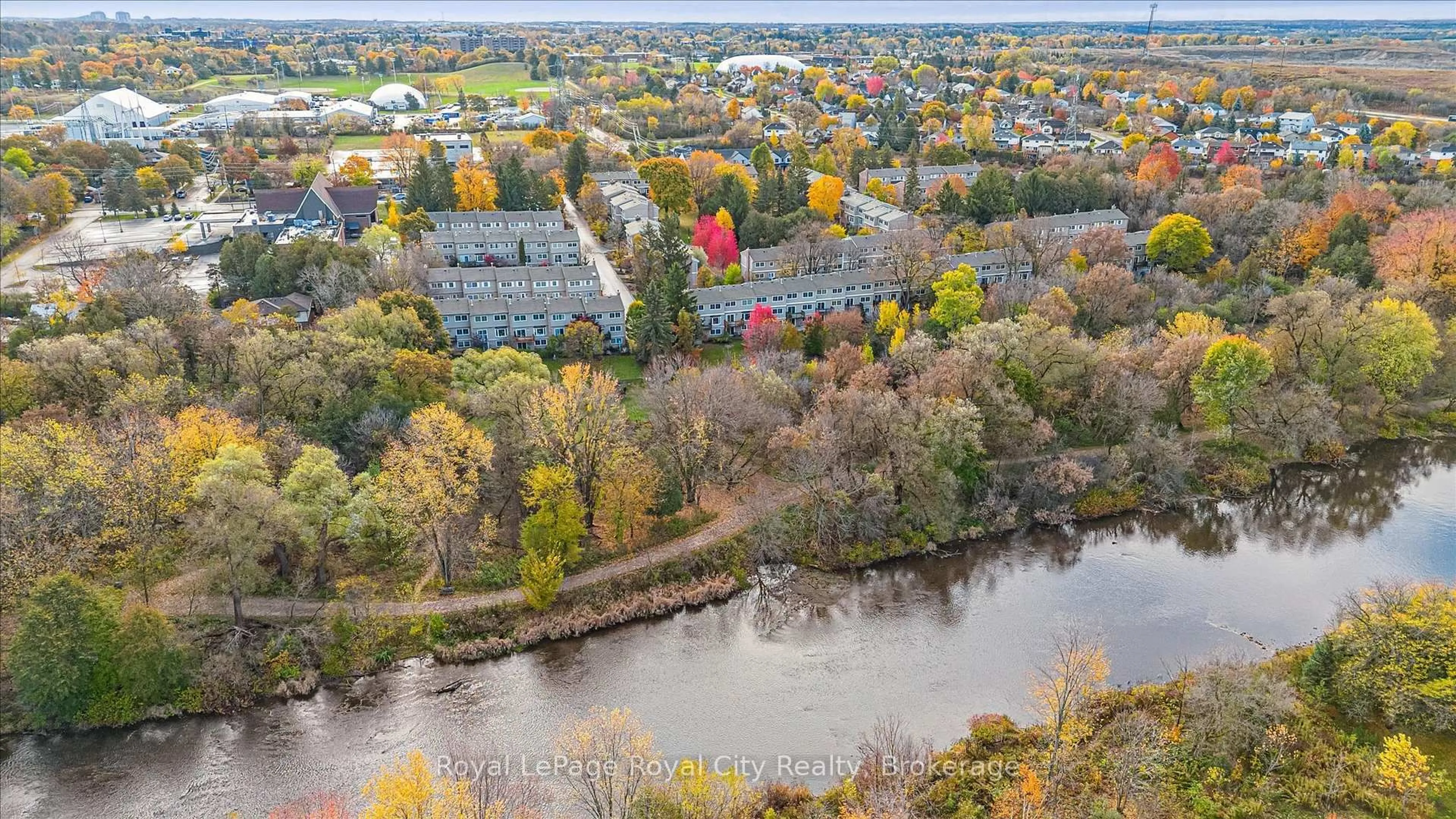 A pic from outside/outdoor area/front of a property/back of a property/a pic from drone, water/lake/river/ocean view for 295 Water St #81, Guelph Ontario N1G 2X5