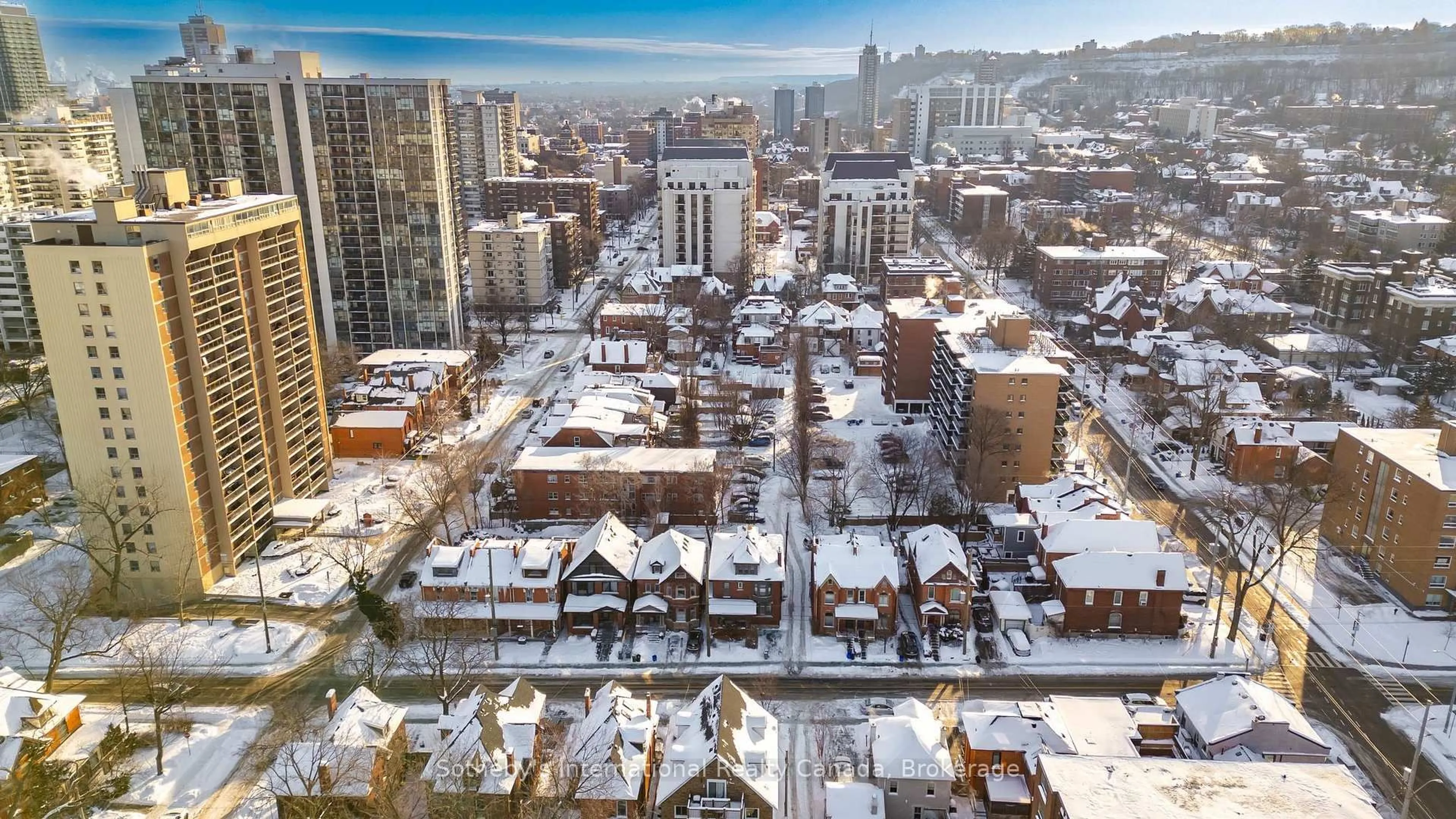 A pic from outside/outdoor area/front of a property/back of a property/a pic from drone, city buildings view from balcony for 217 Caroline St, Hamilton Ontario L8P 3L5