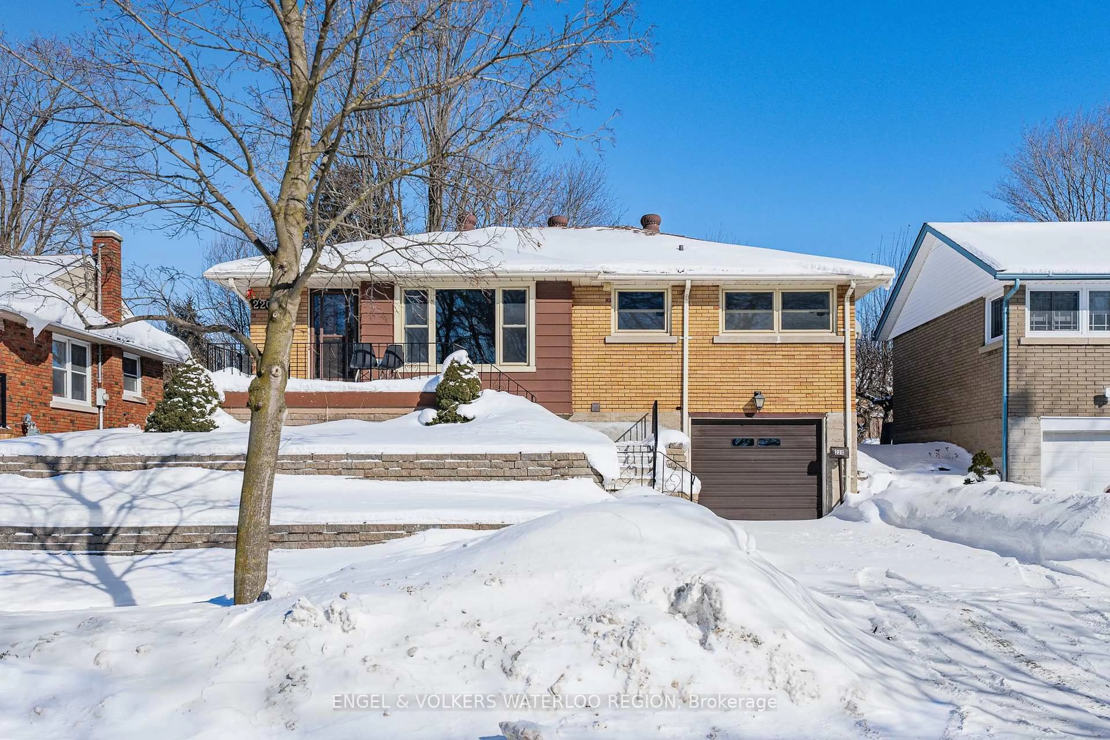 Home with brick exterior material, street for 220 Clark Ave, Kitchener Ontario N2C 1Y5