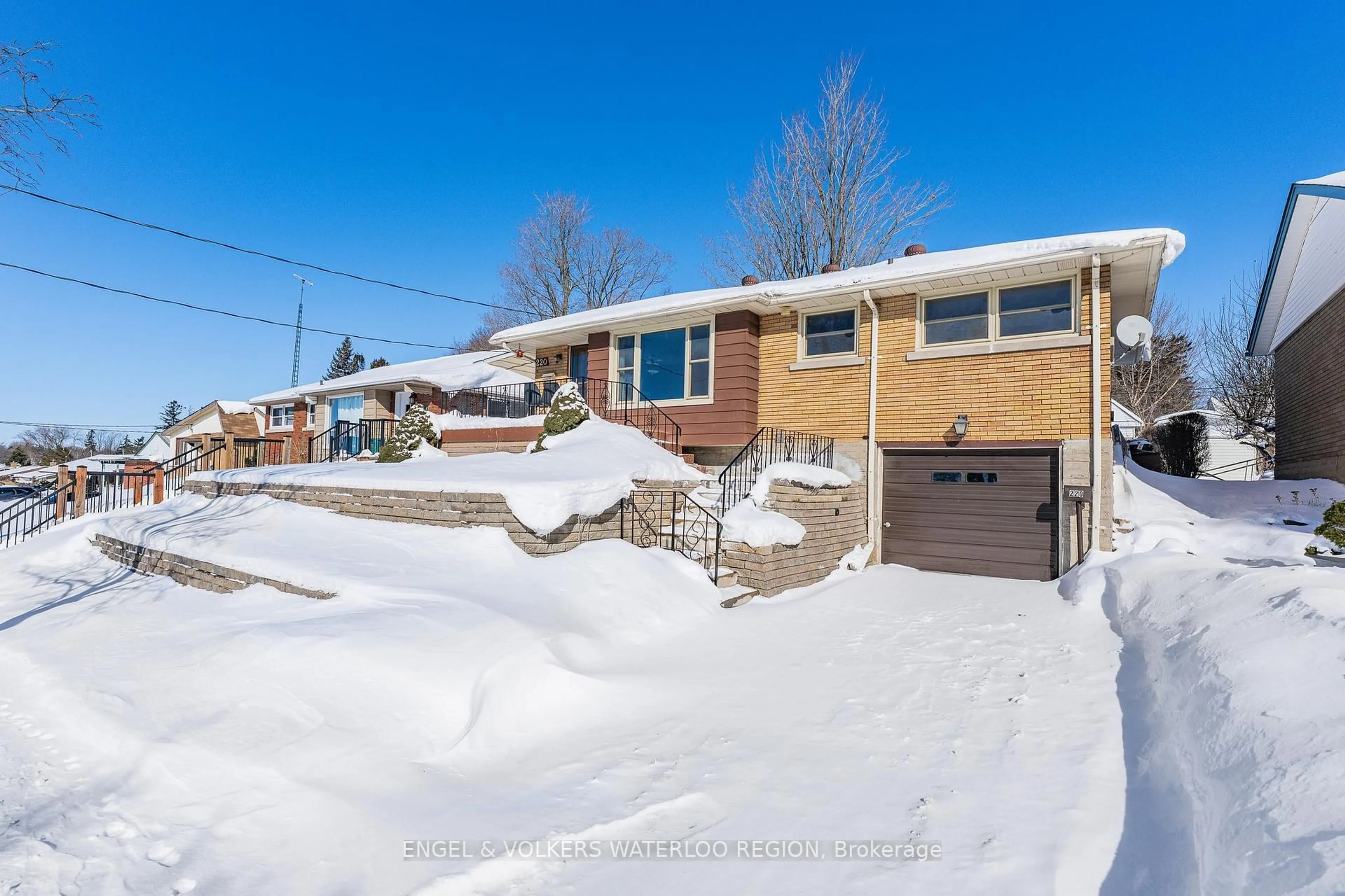 Home with brick exterior material, street for 220 Clark Ave, Kitchener Ontario N2C 1Y5