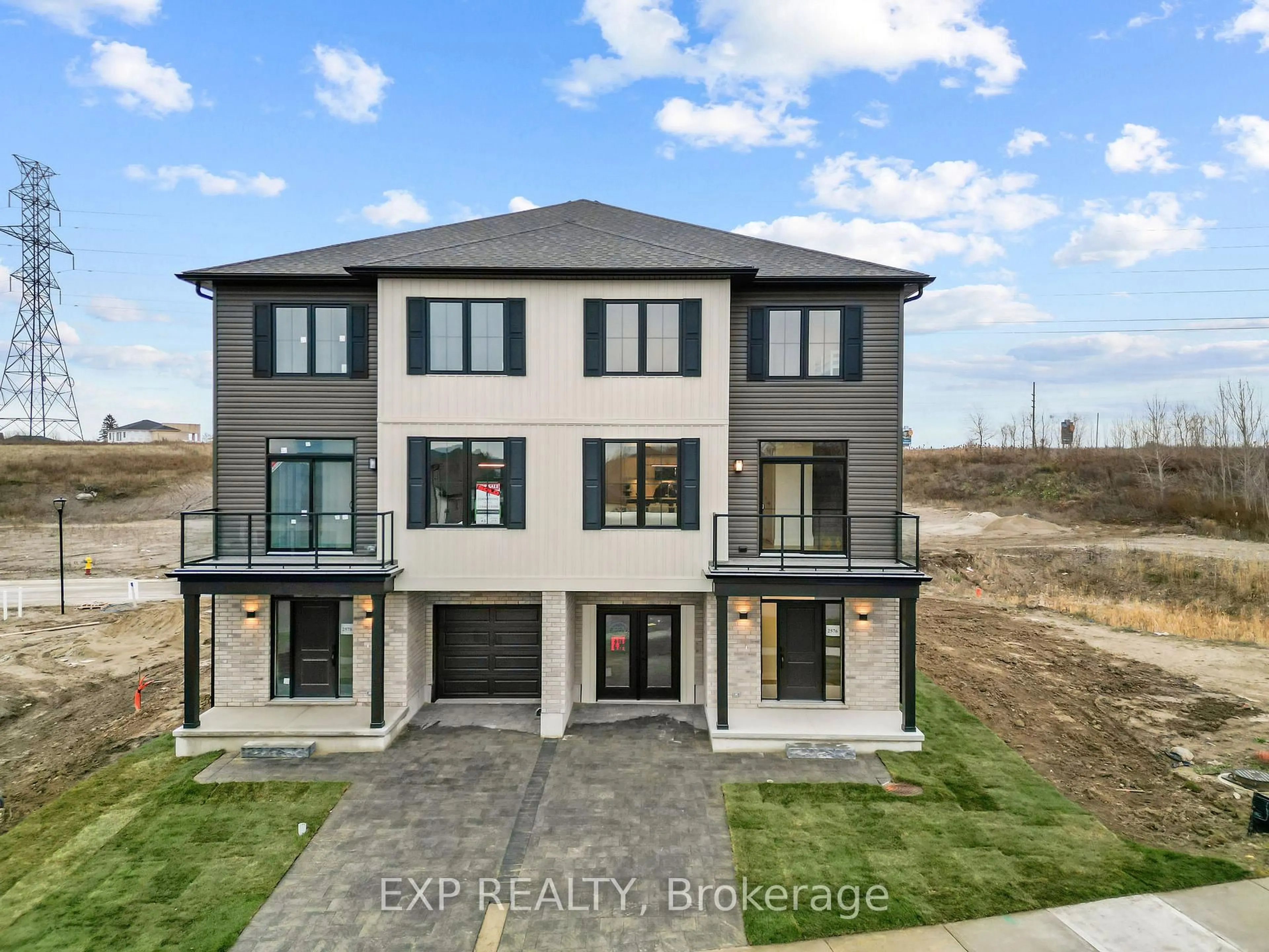 A pic from outside/outdoor area/front of a property/back of a property/a pic from drone, unknown for 2605 Kettering Pl #10, London South Ontario N6M 0G4